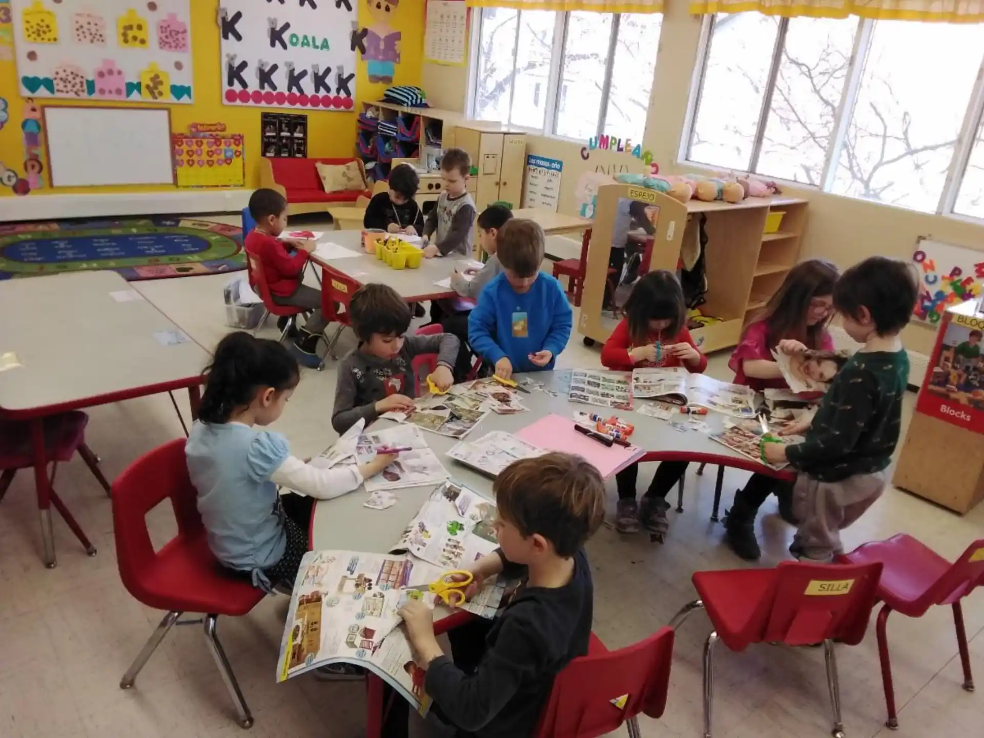 a group of children sitting at a table