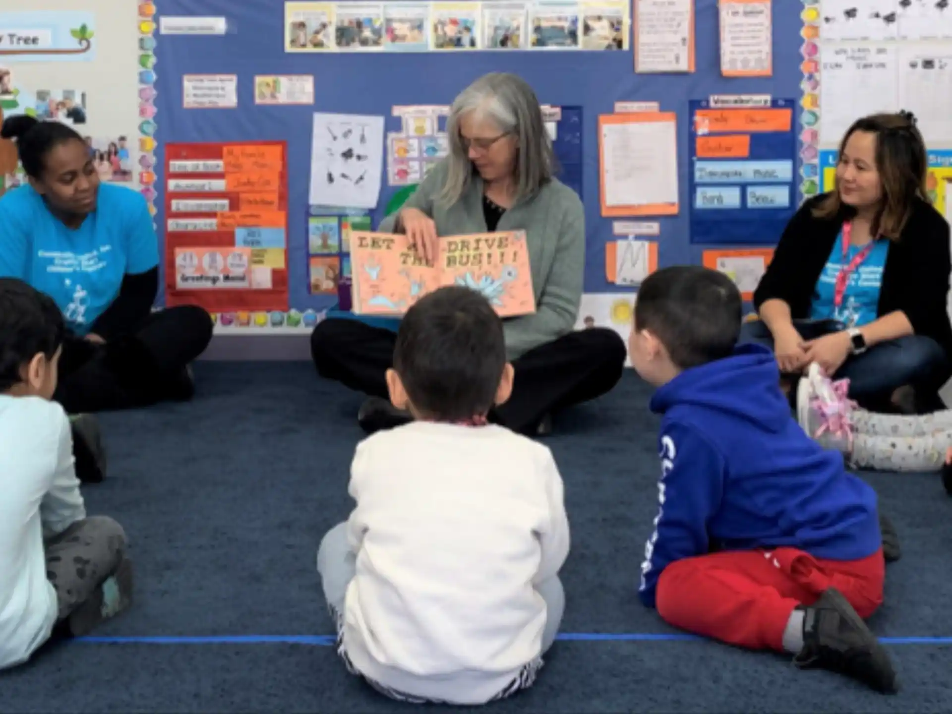 a person teaching children in a classroom