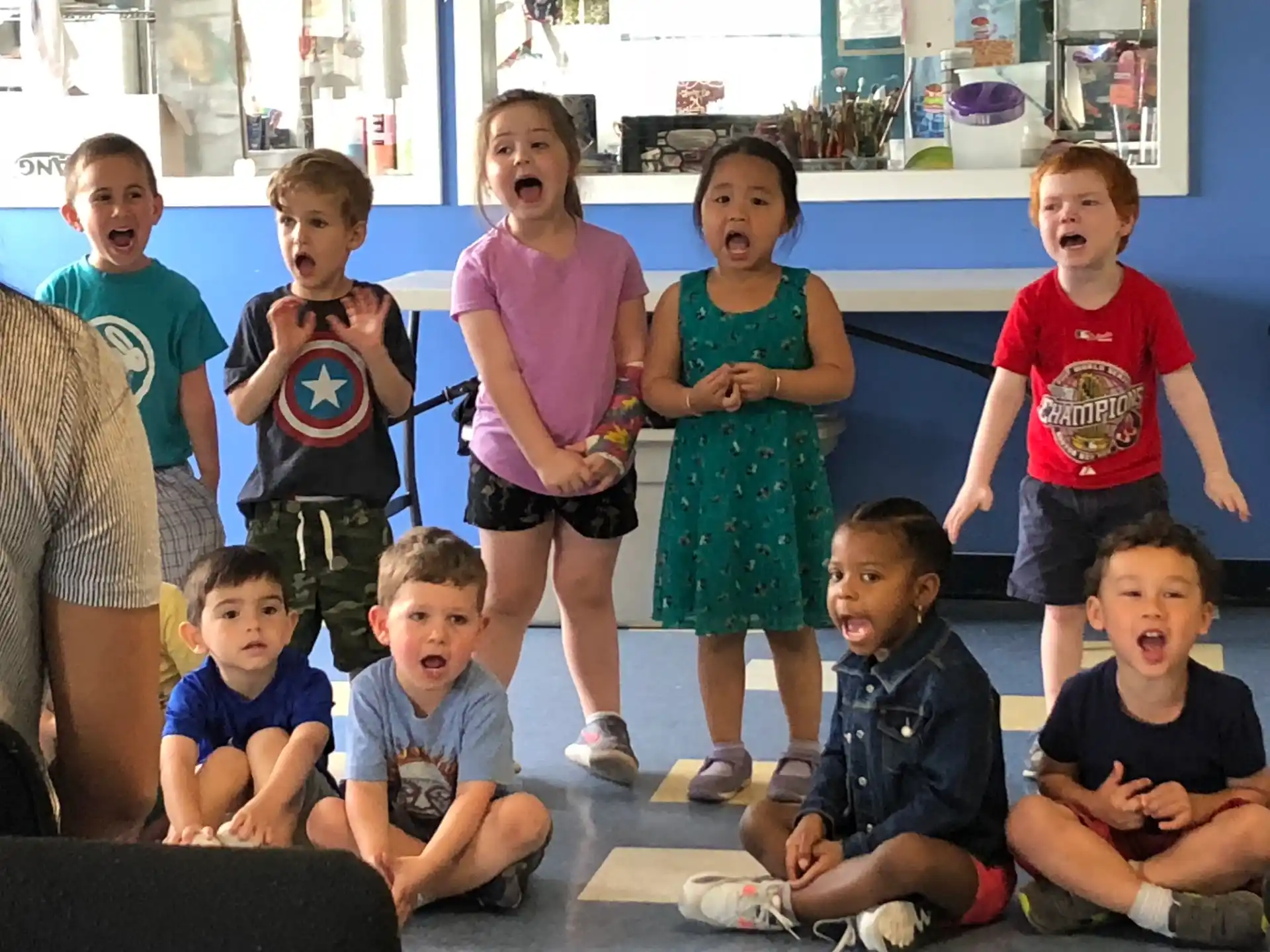 a group of children posing for a photo