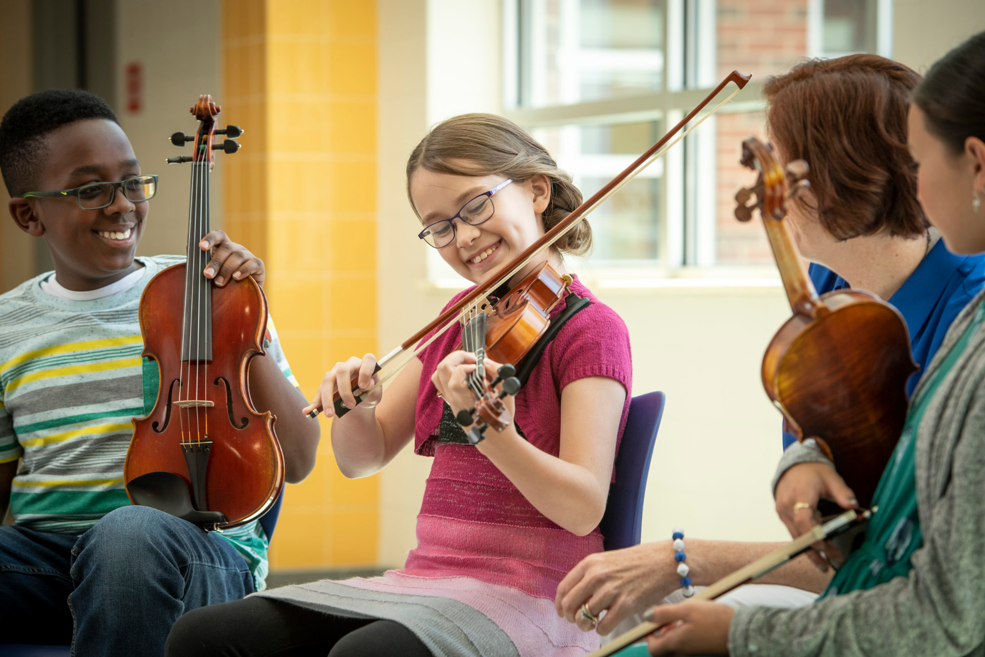a group of people playing instruments