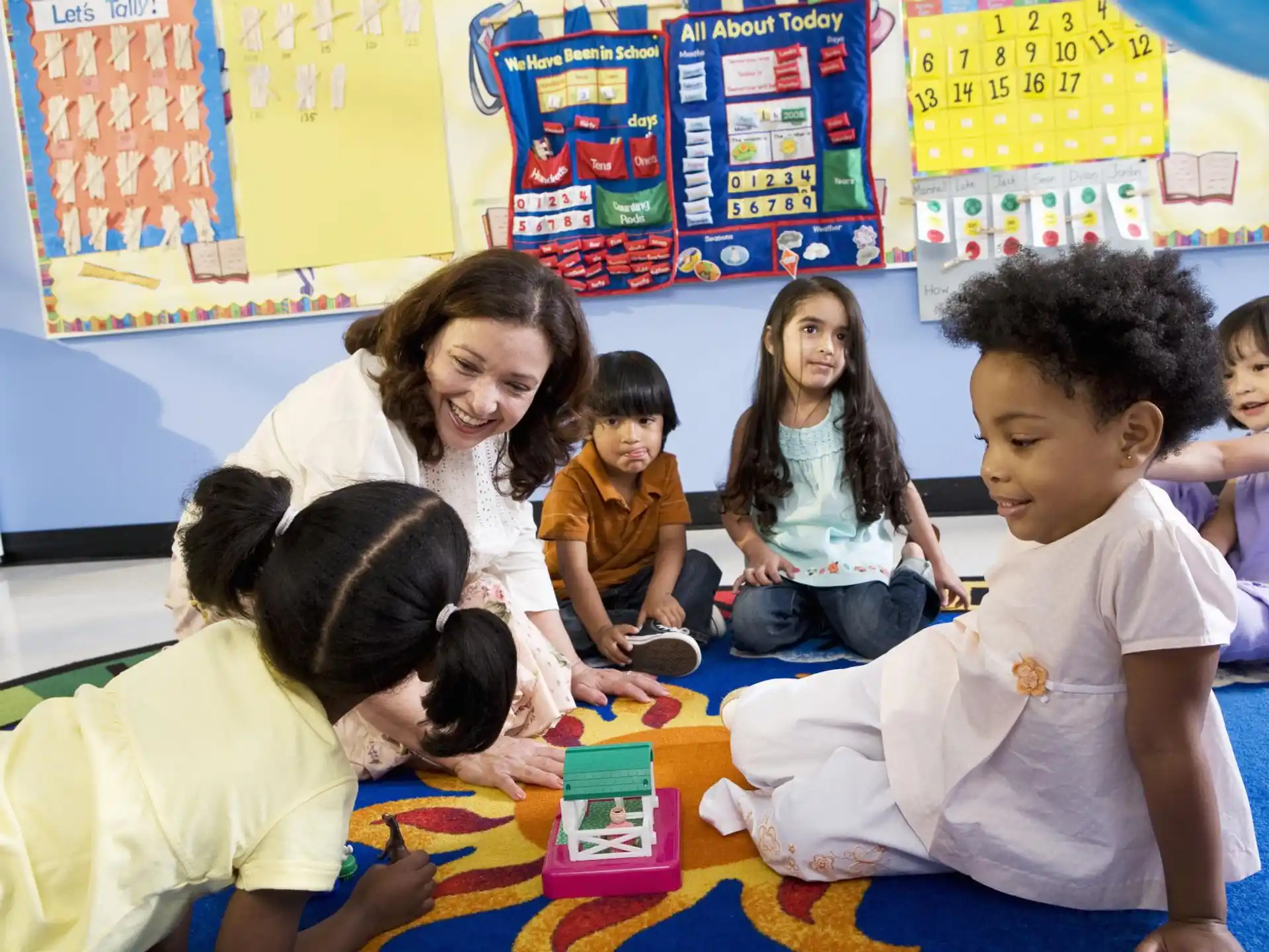 a group of children sitting on the floor