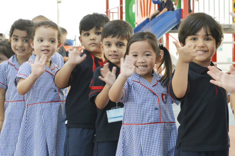 a group of children posing for a photo