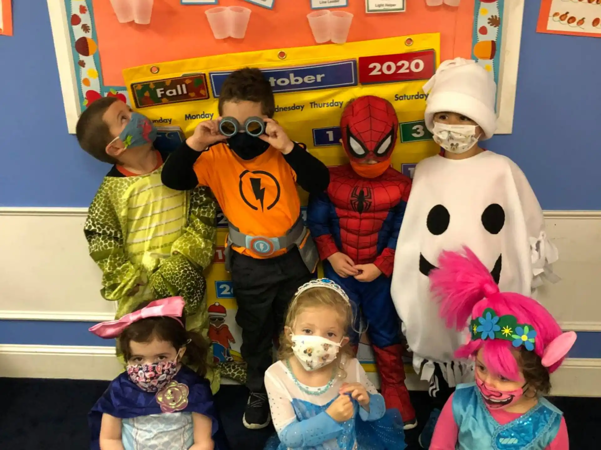 a group of children wearing clothing
