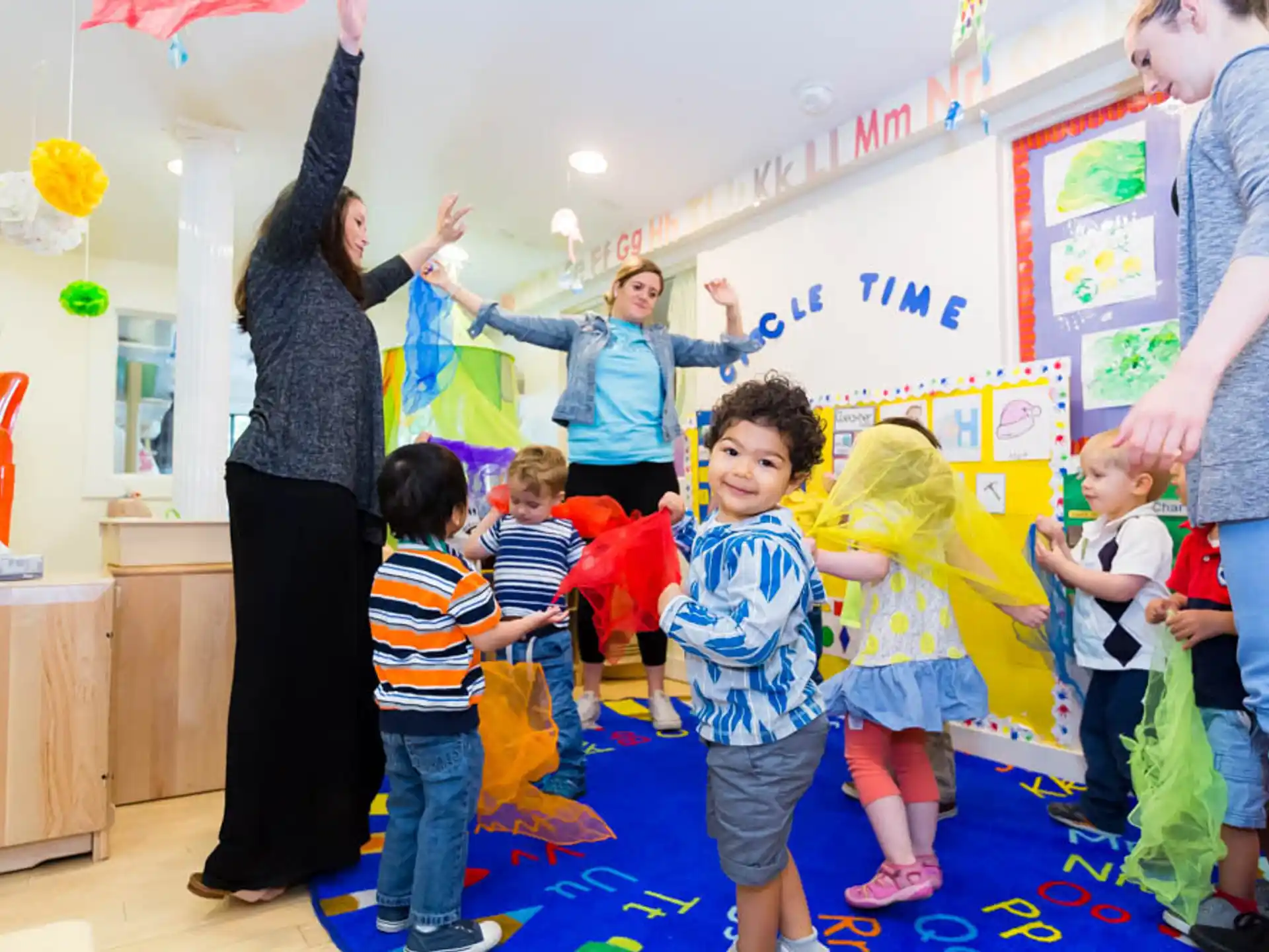a person teaching children in a classroom