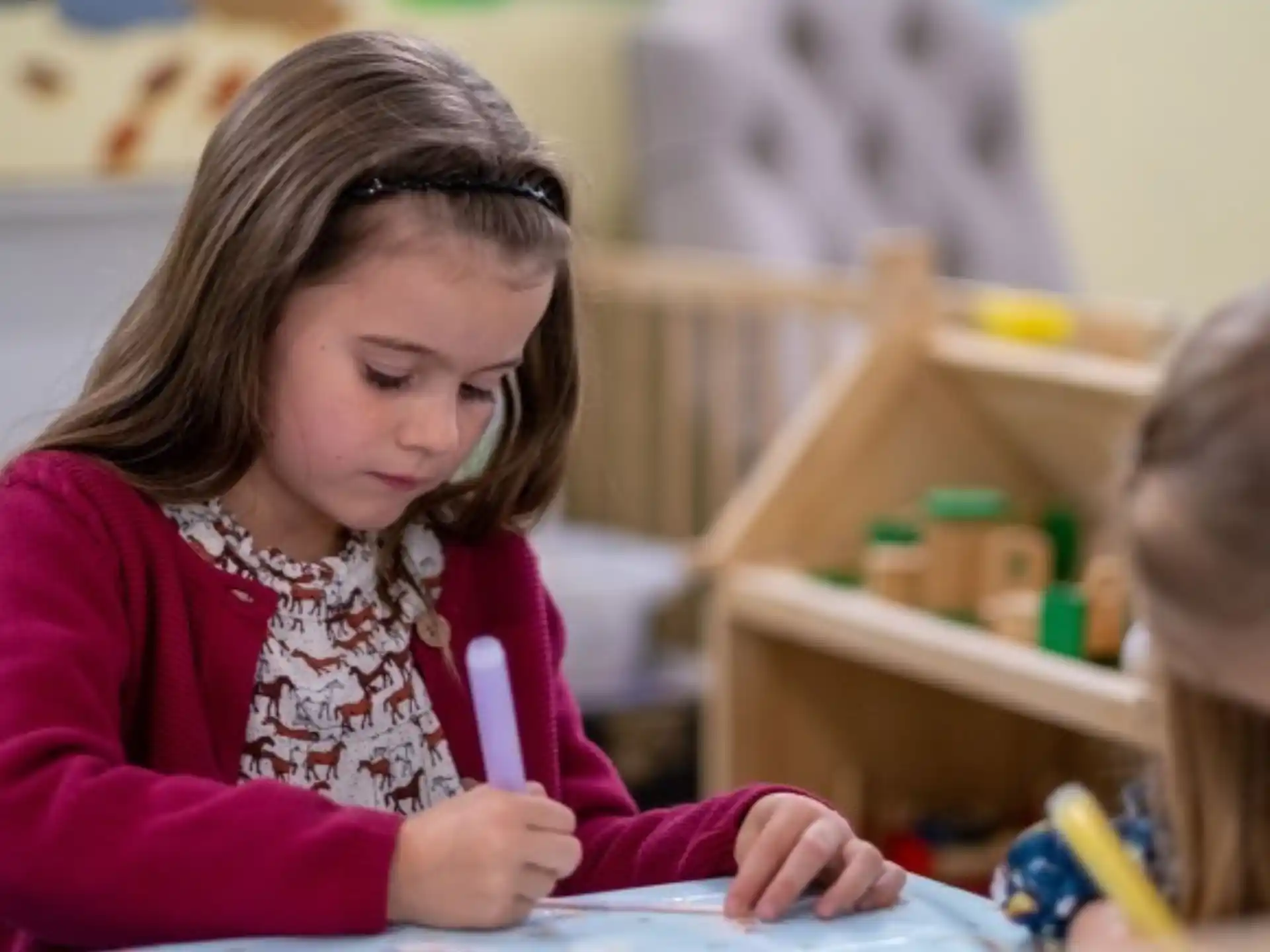 a young girl and a young girl painting