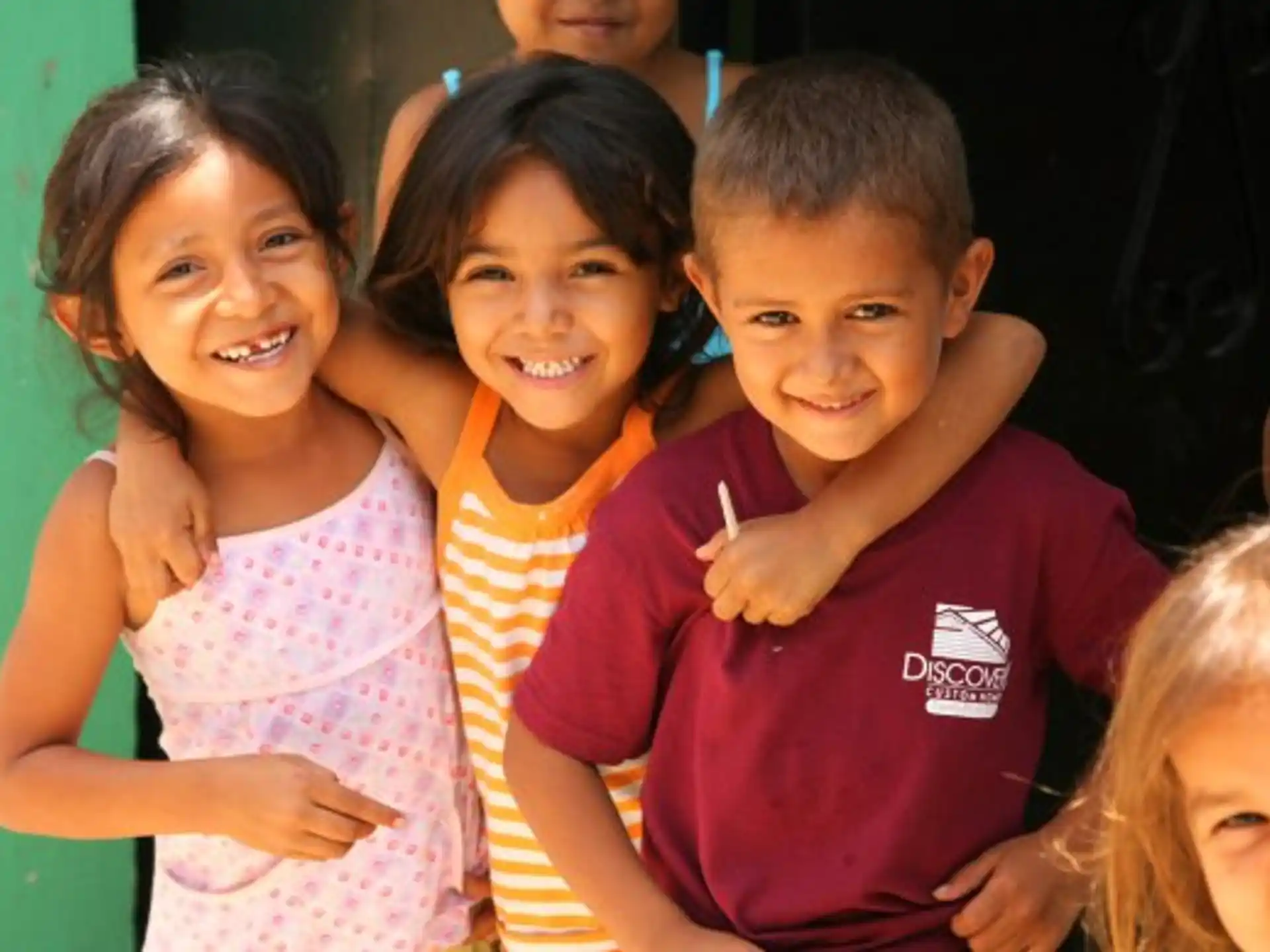 a group of children smiling