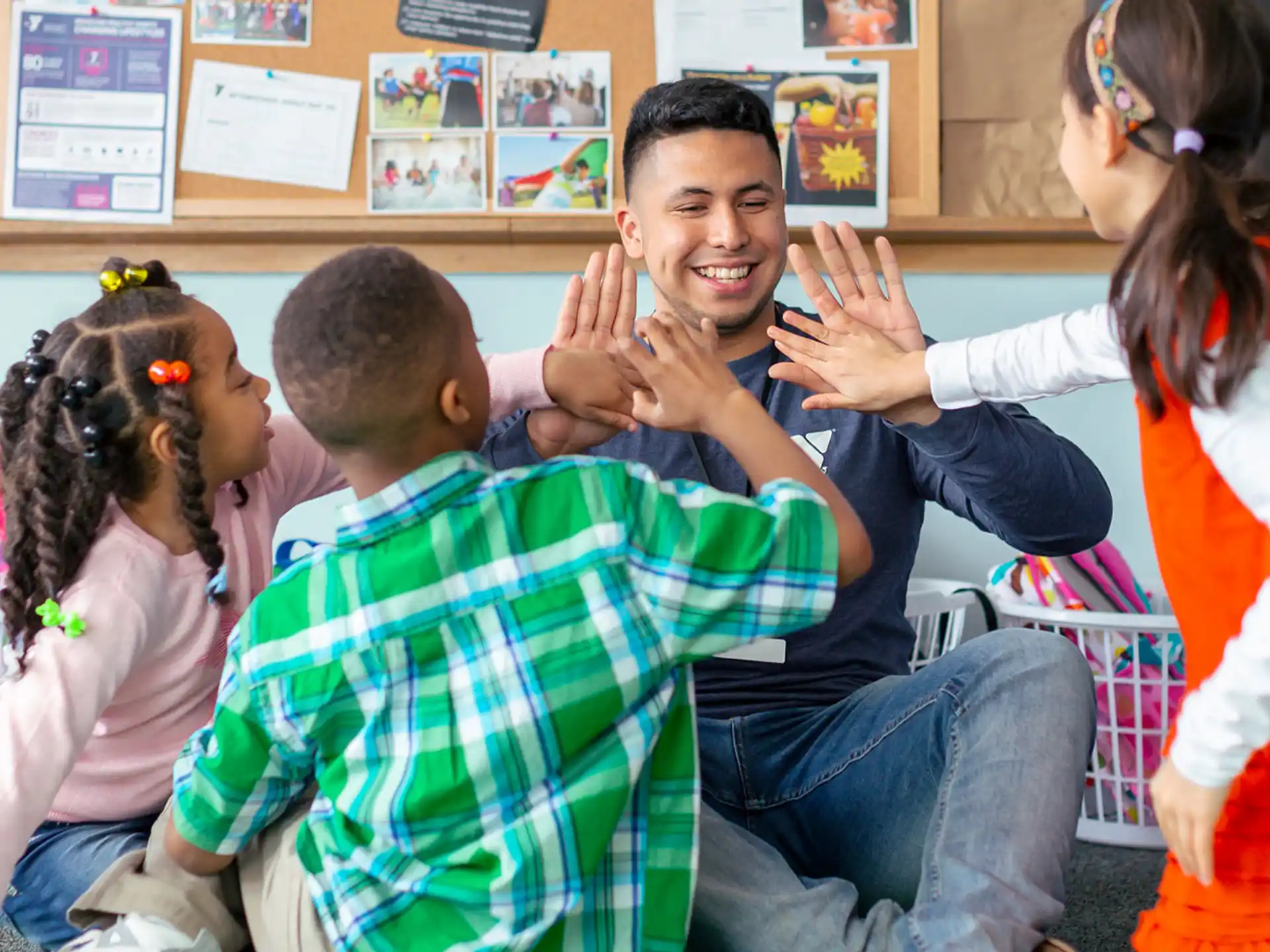 a group of people sitting in a classroom