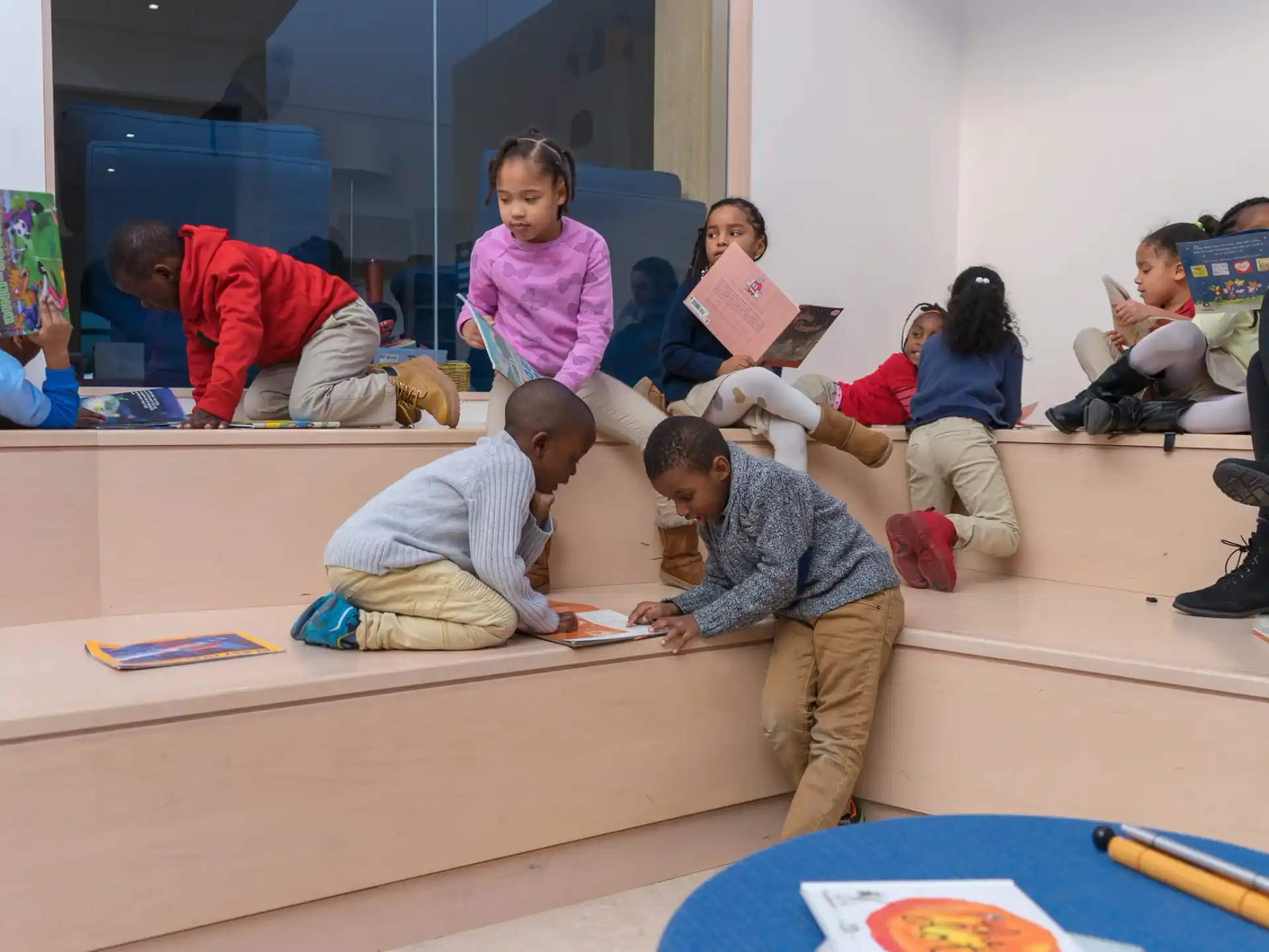 a group of people sitting on the floor