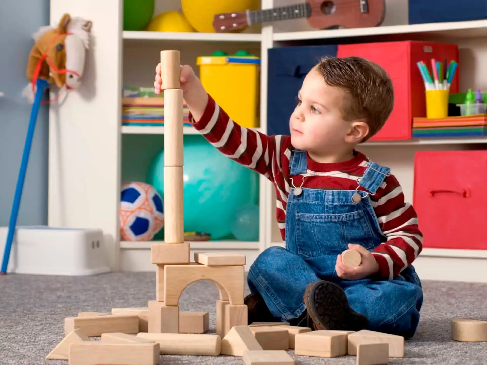 a child playing with building blocks