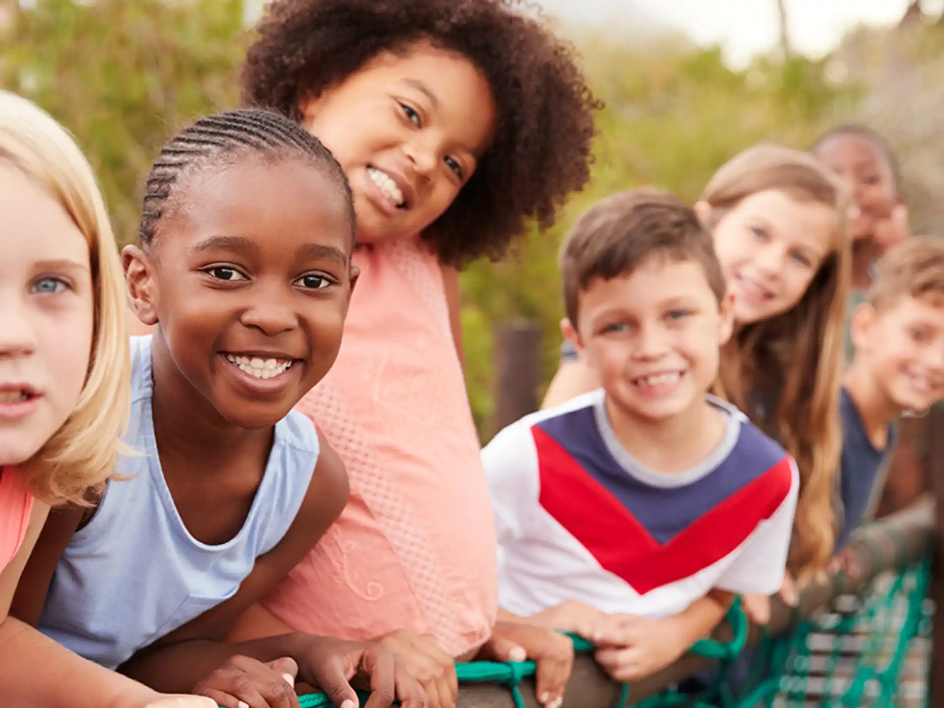 a group of children smiling
