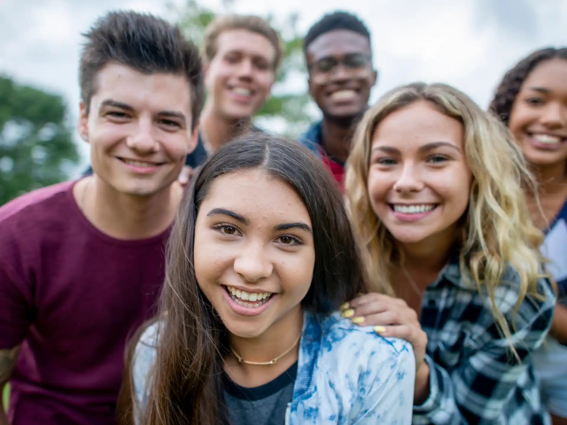 a group of people posing for a photo