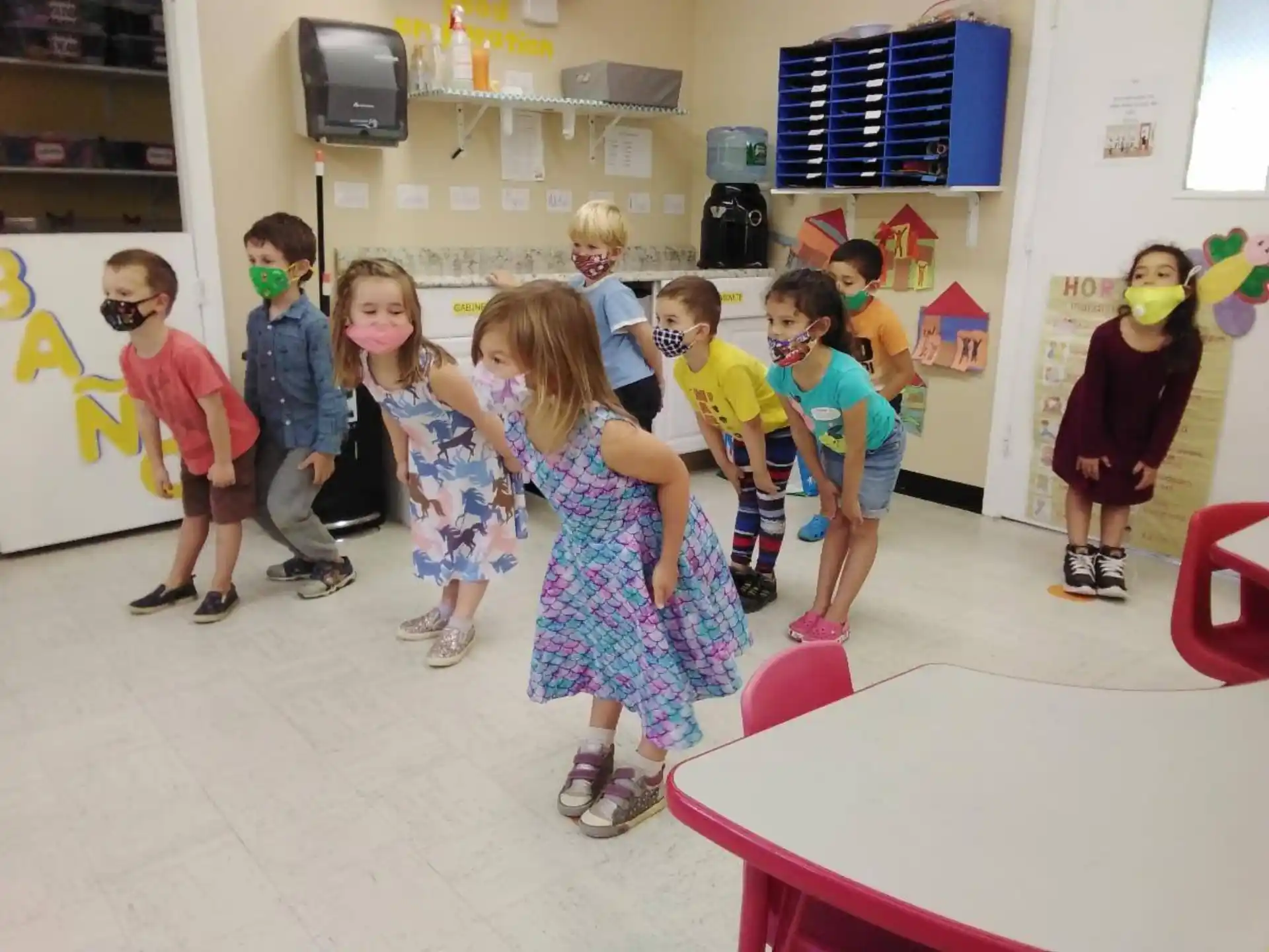 a group of children in a classroom