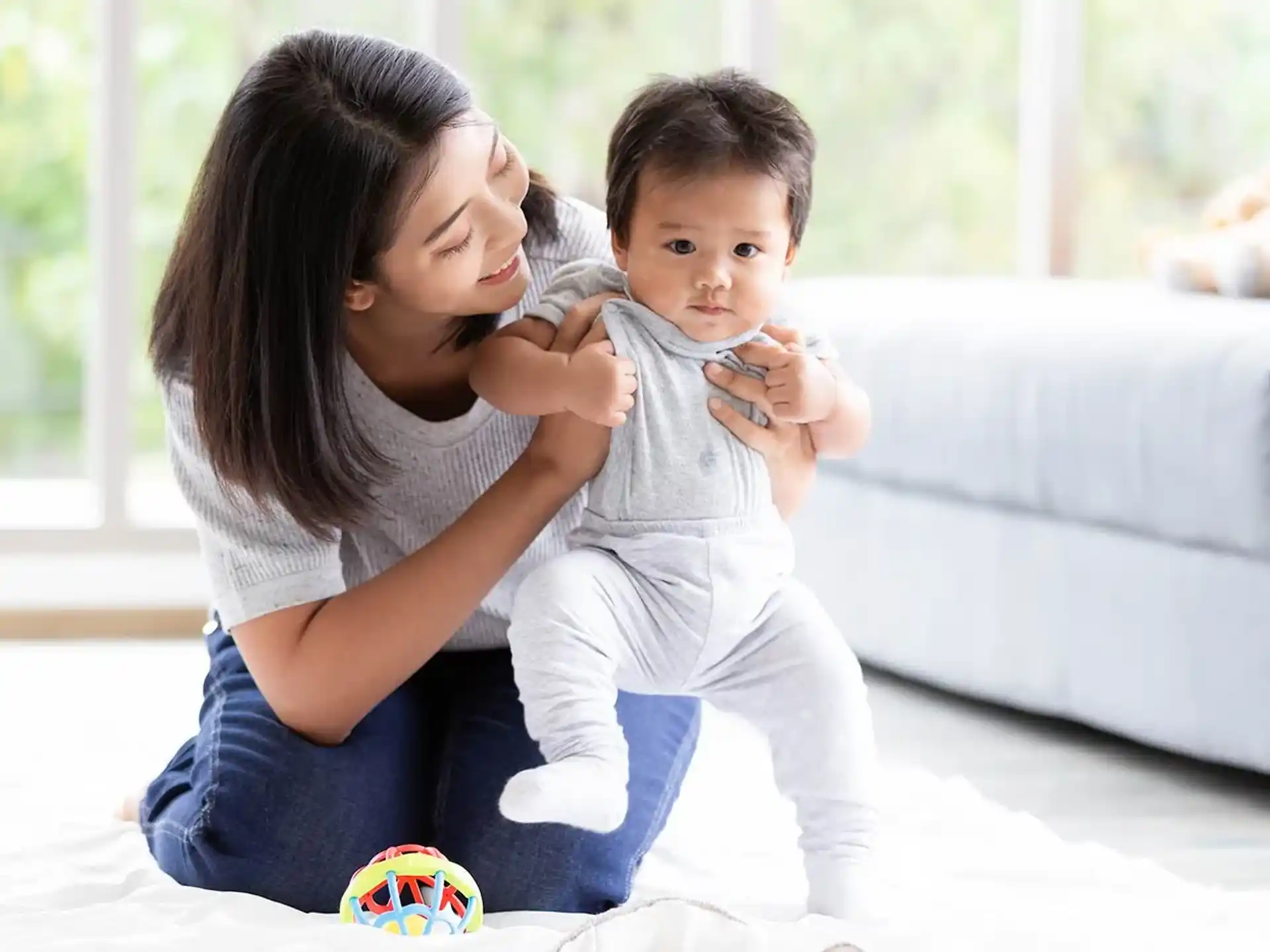 a person holding a baby