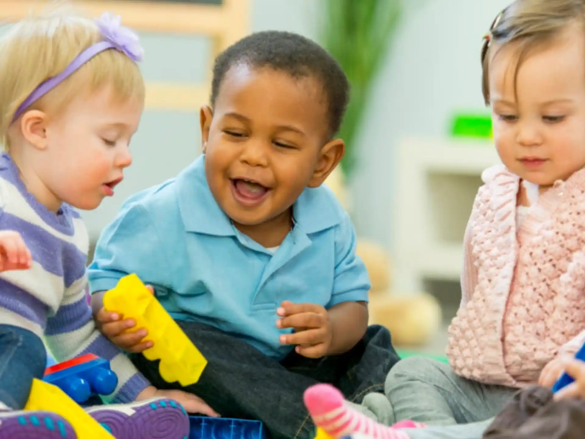 a group of children sitting on the floor