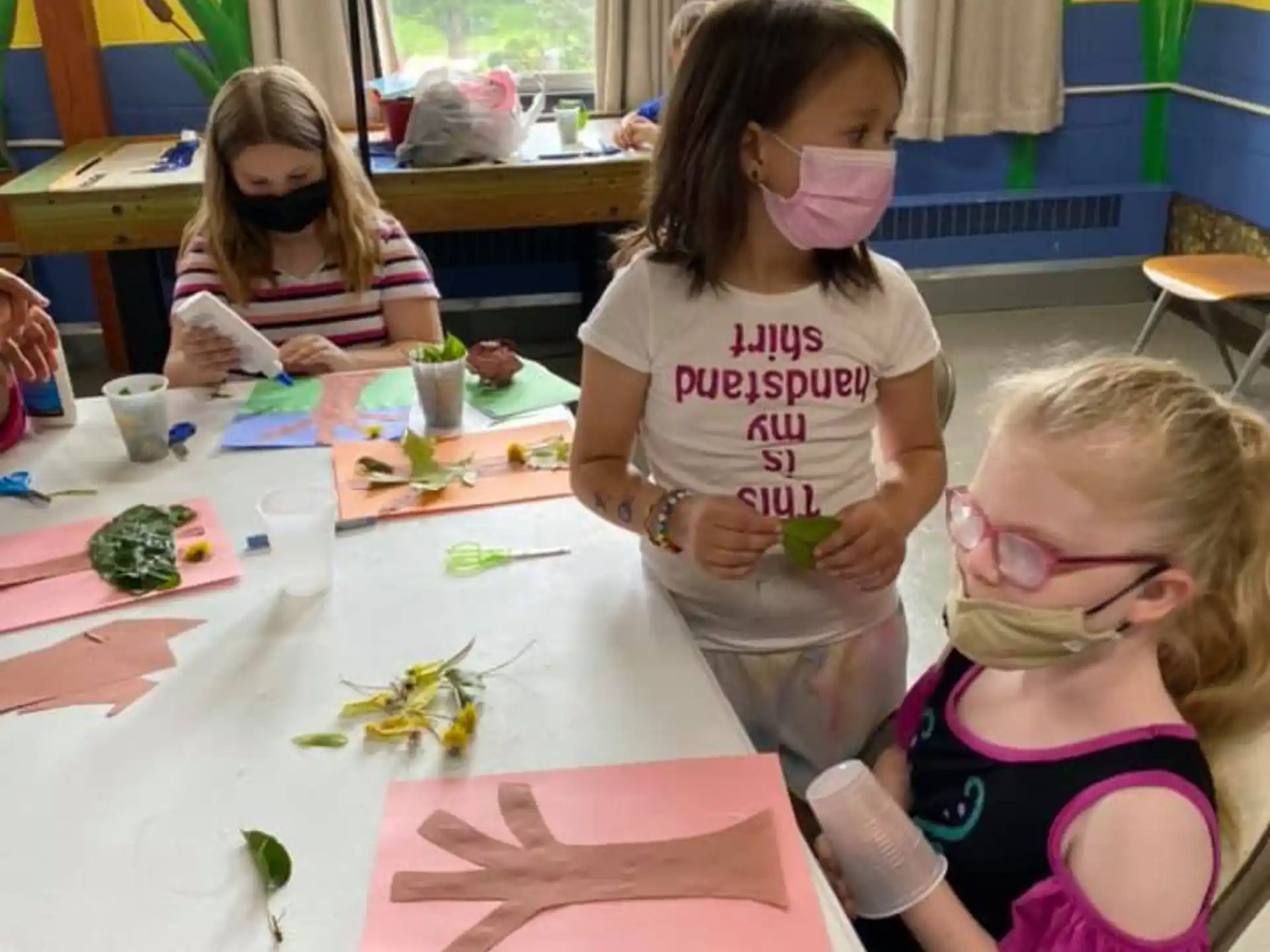 a group of girls painting