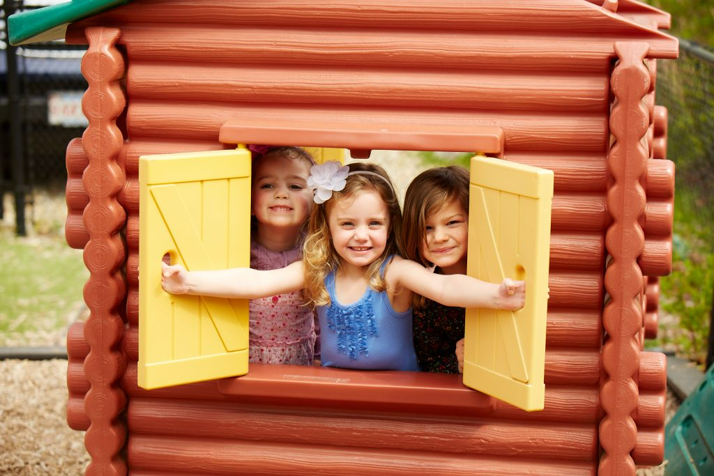 a group of girls in a play structure