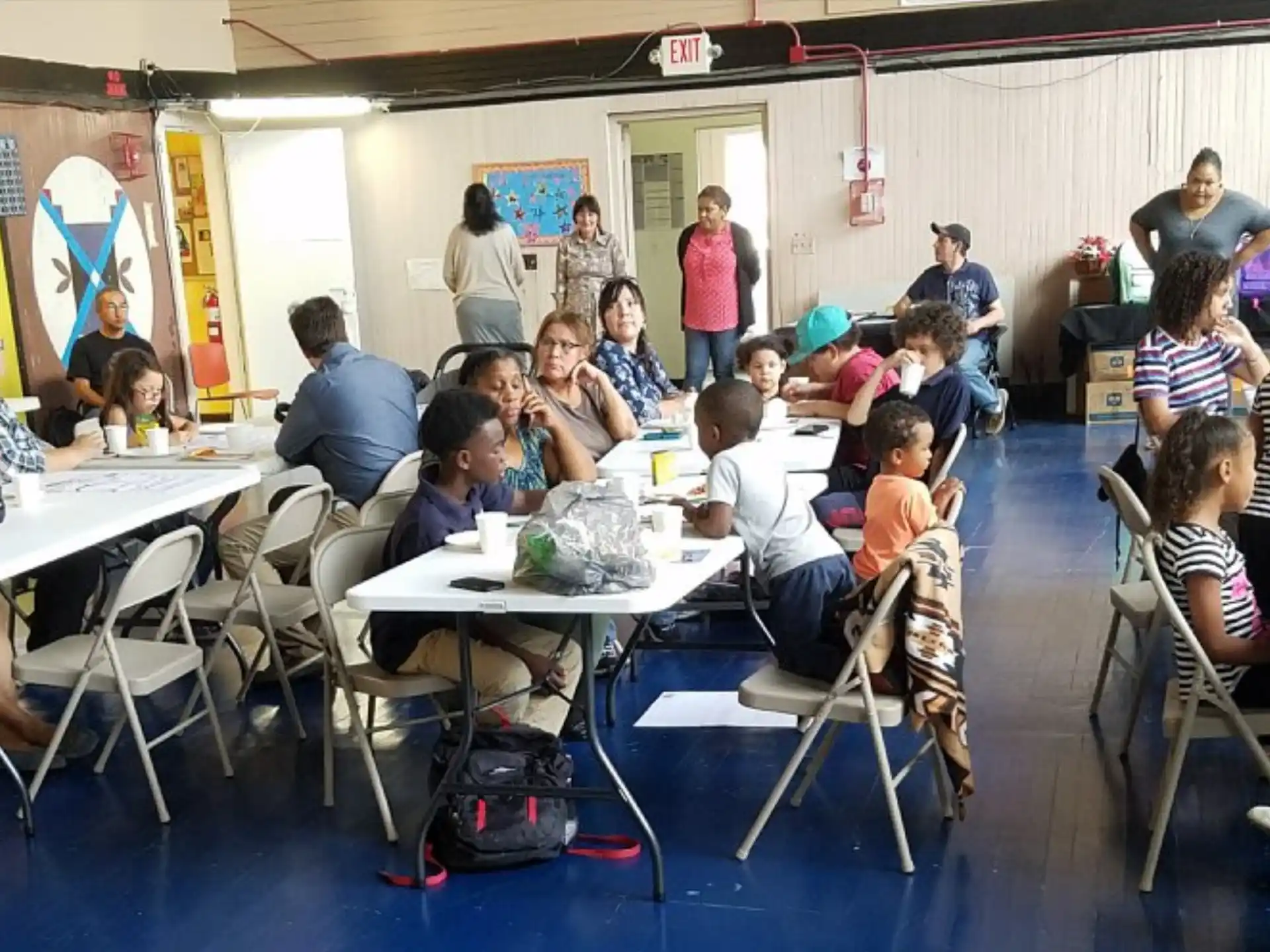 a group of people sitting at tables