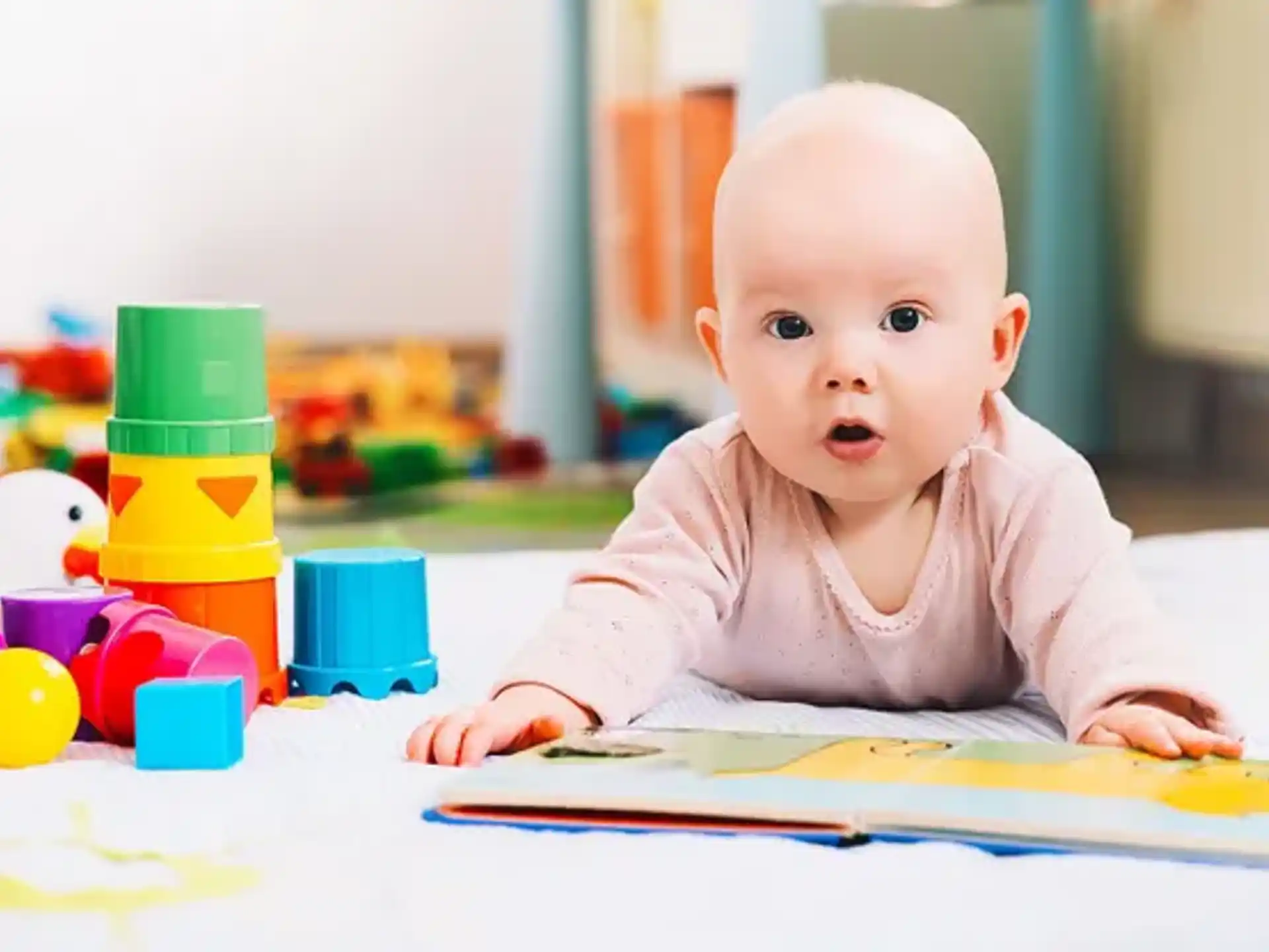 a baby sitting on a table