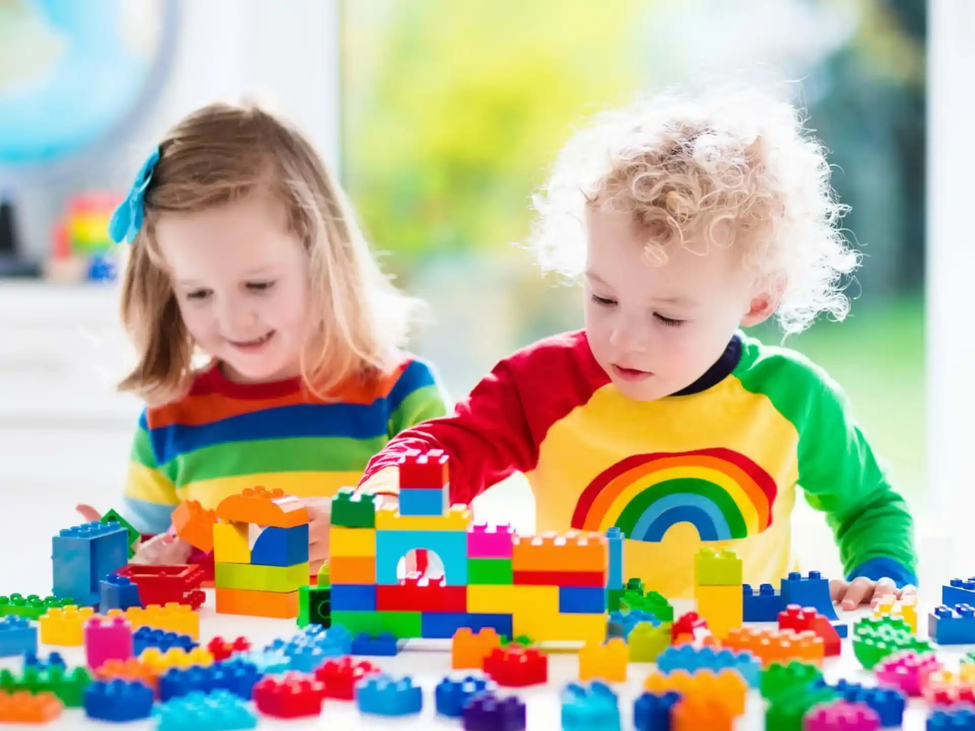 two children playing with toys