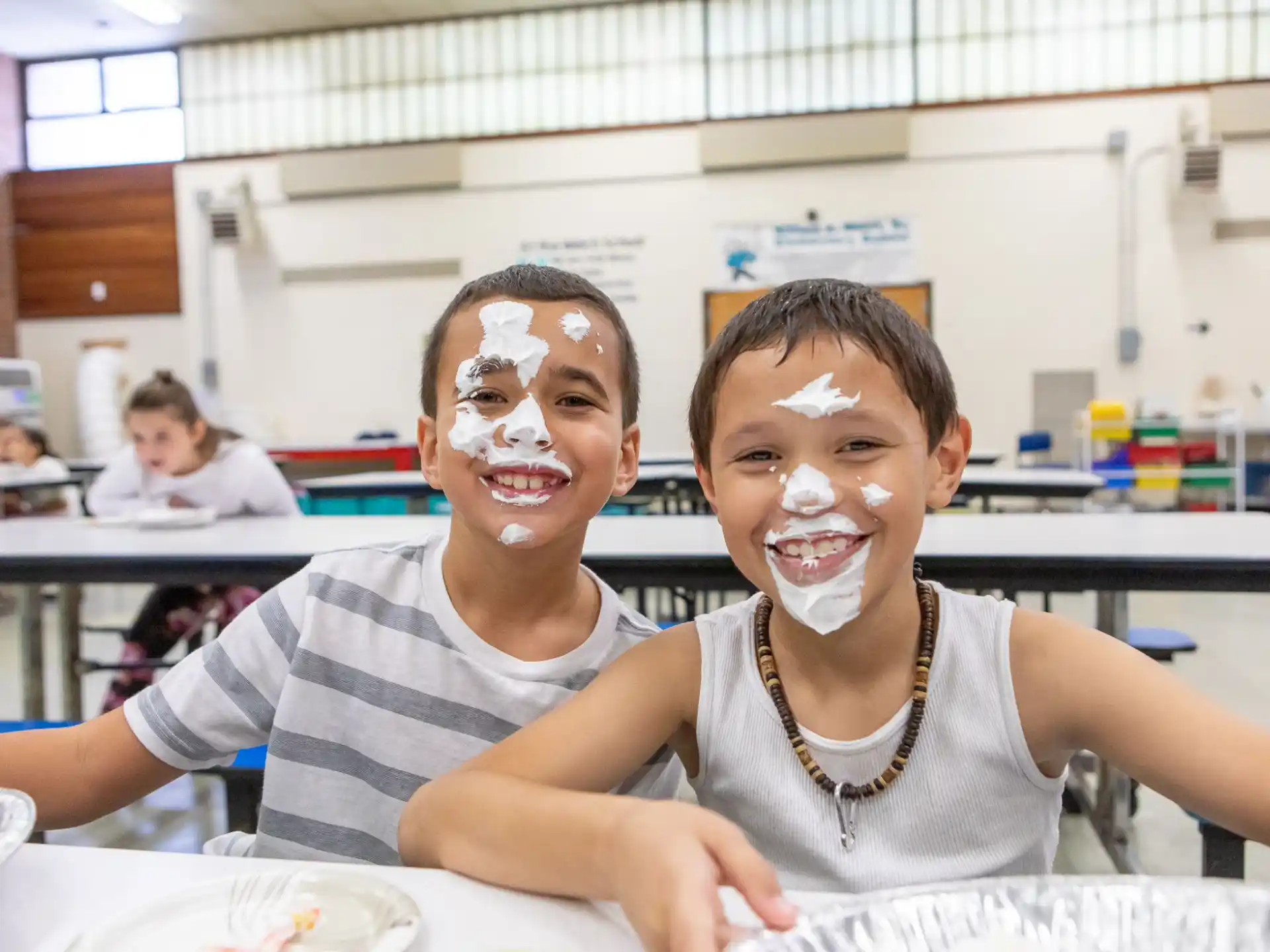 a couple of boys with face paint