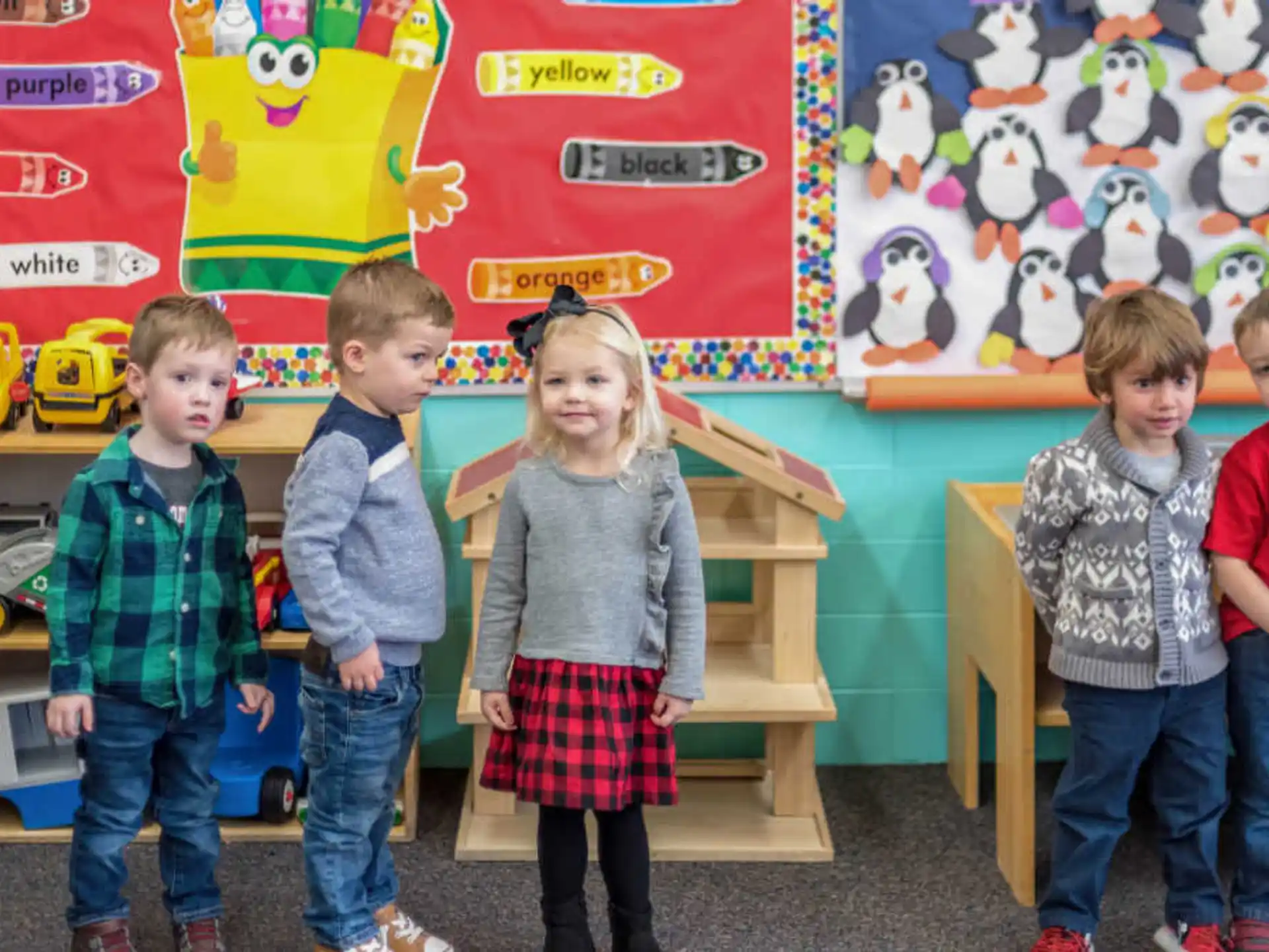 a group of children posing for a photo