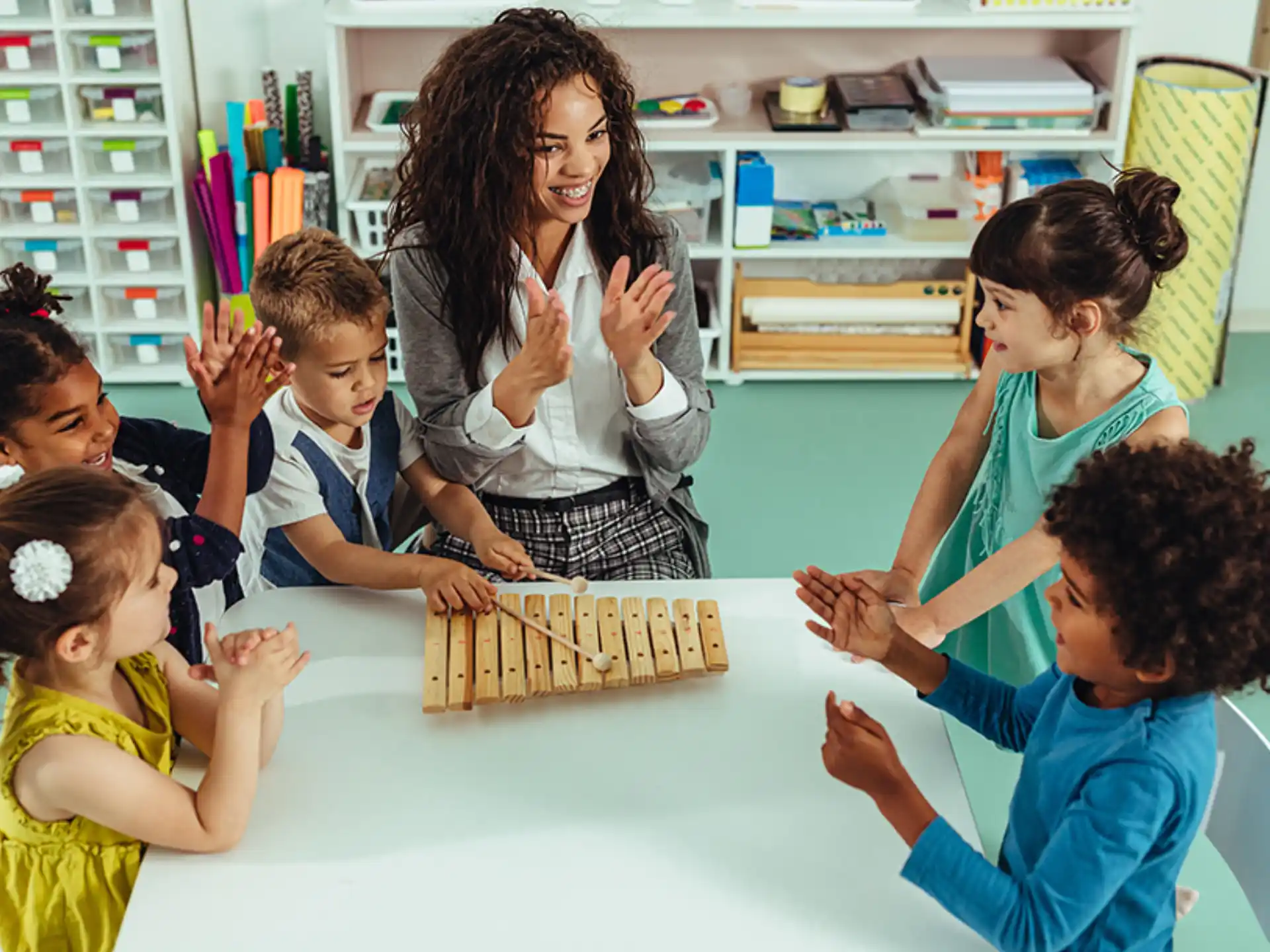 a group of children playing chess
