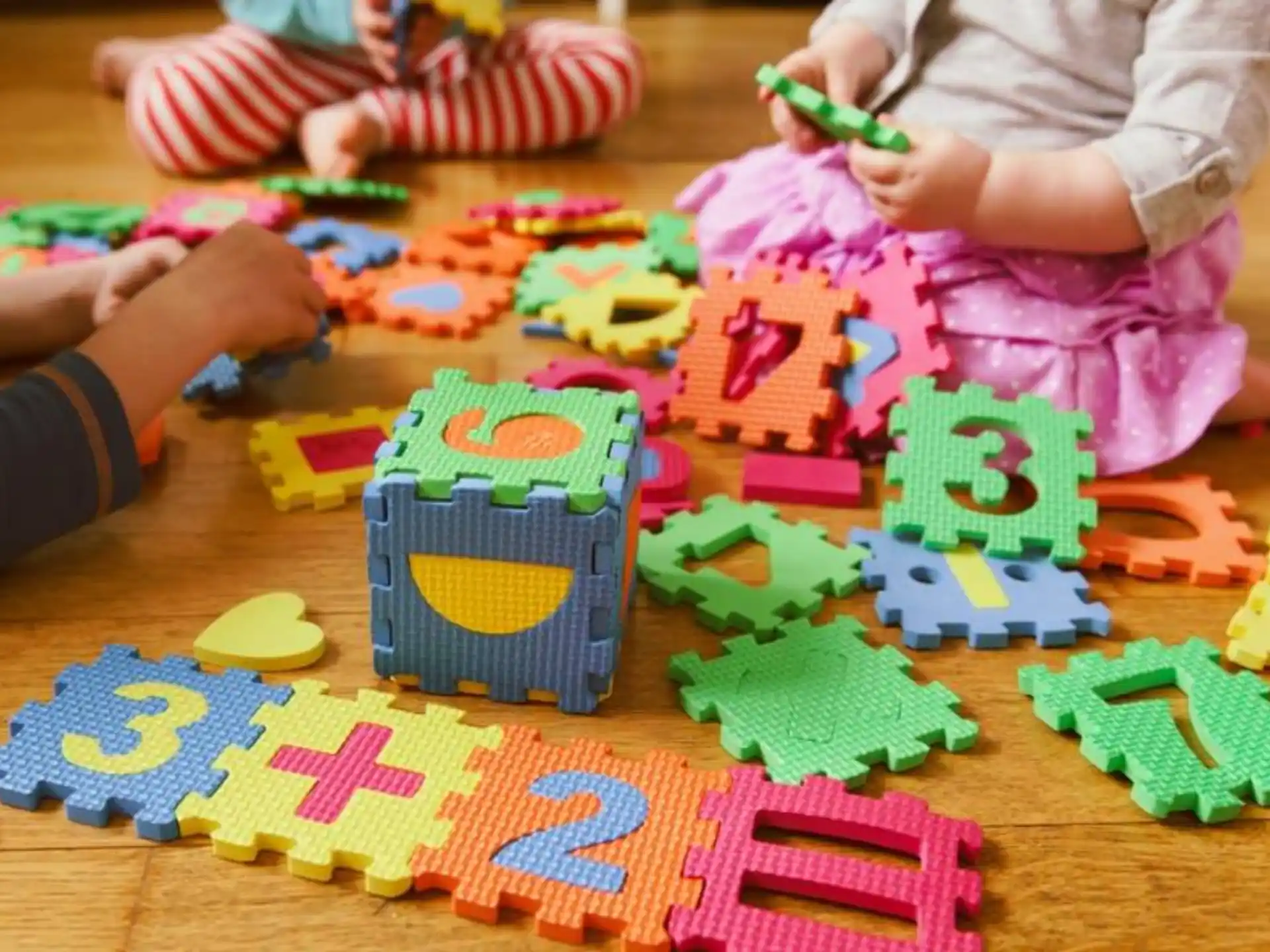 a group of children playing with toys