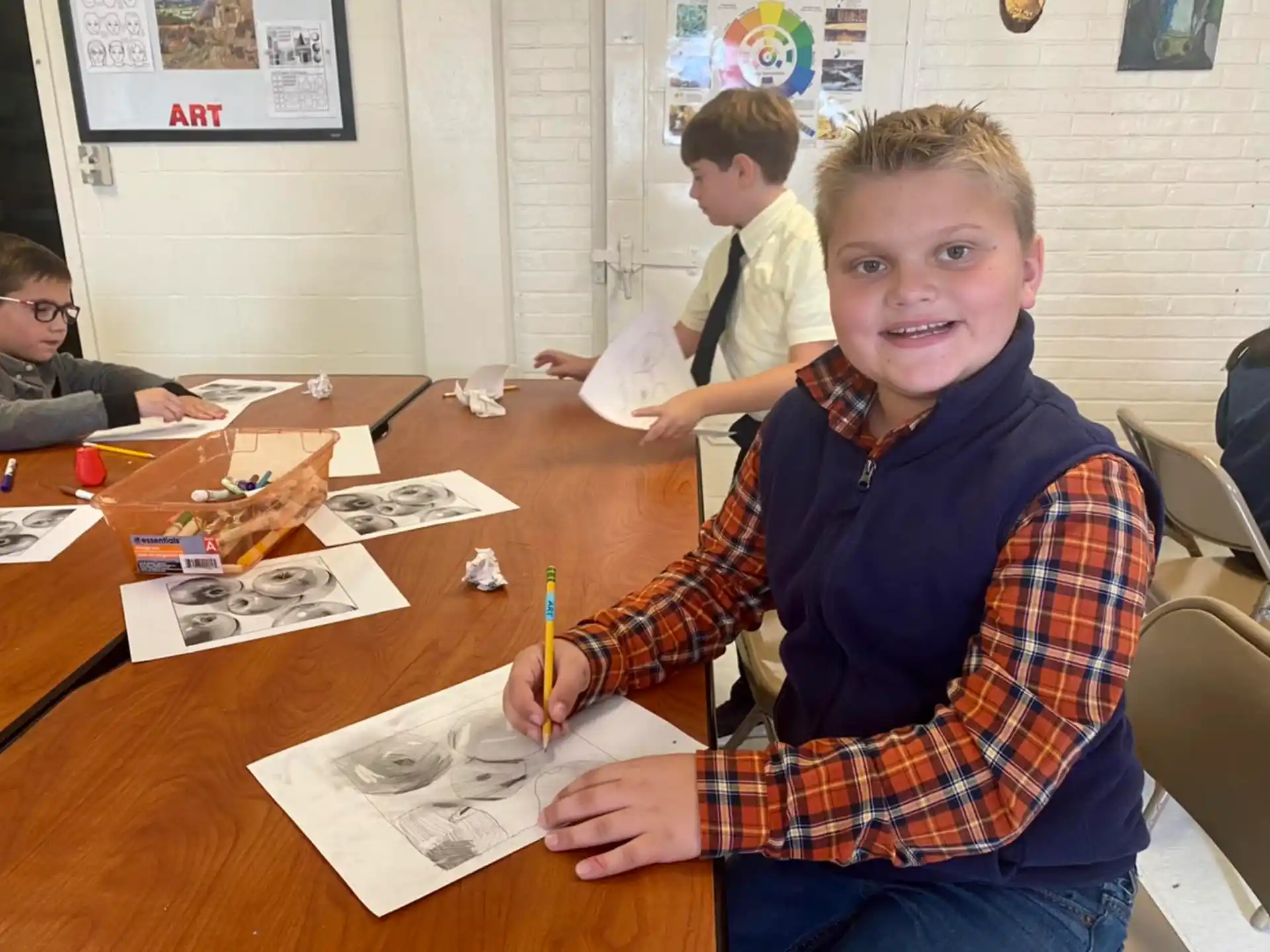 a boy sitting at a table