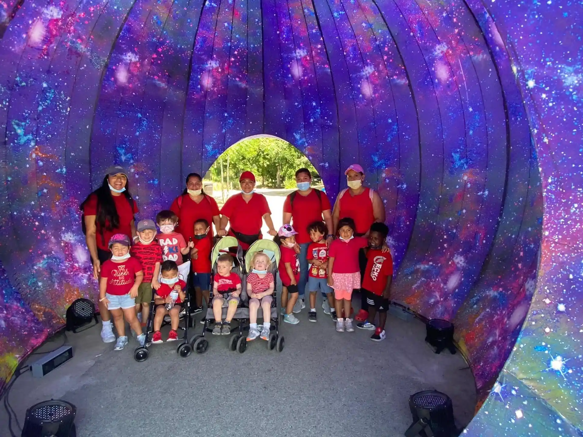 a group of people posing for a photo