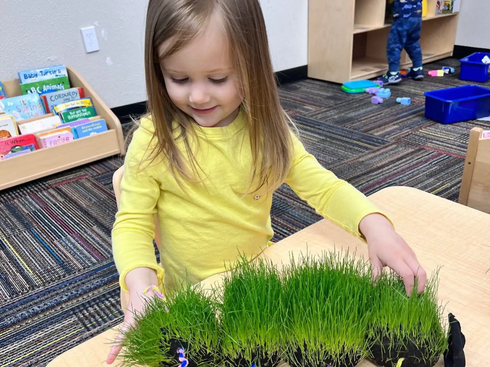 a girl playing with toys