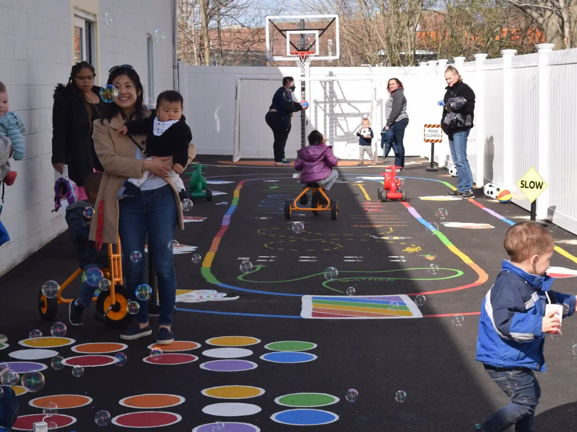 a group of people playing on a playground