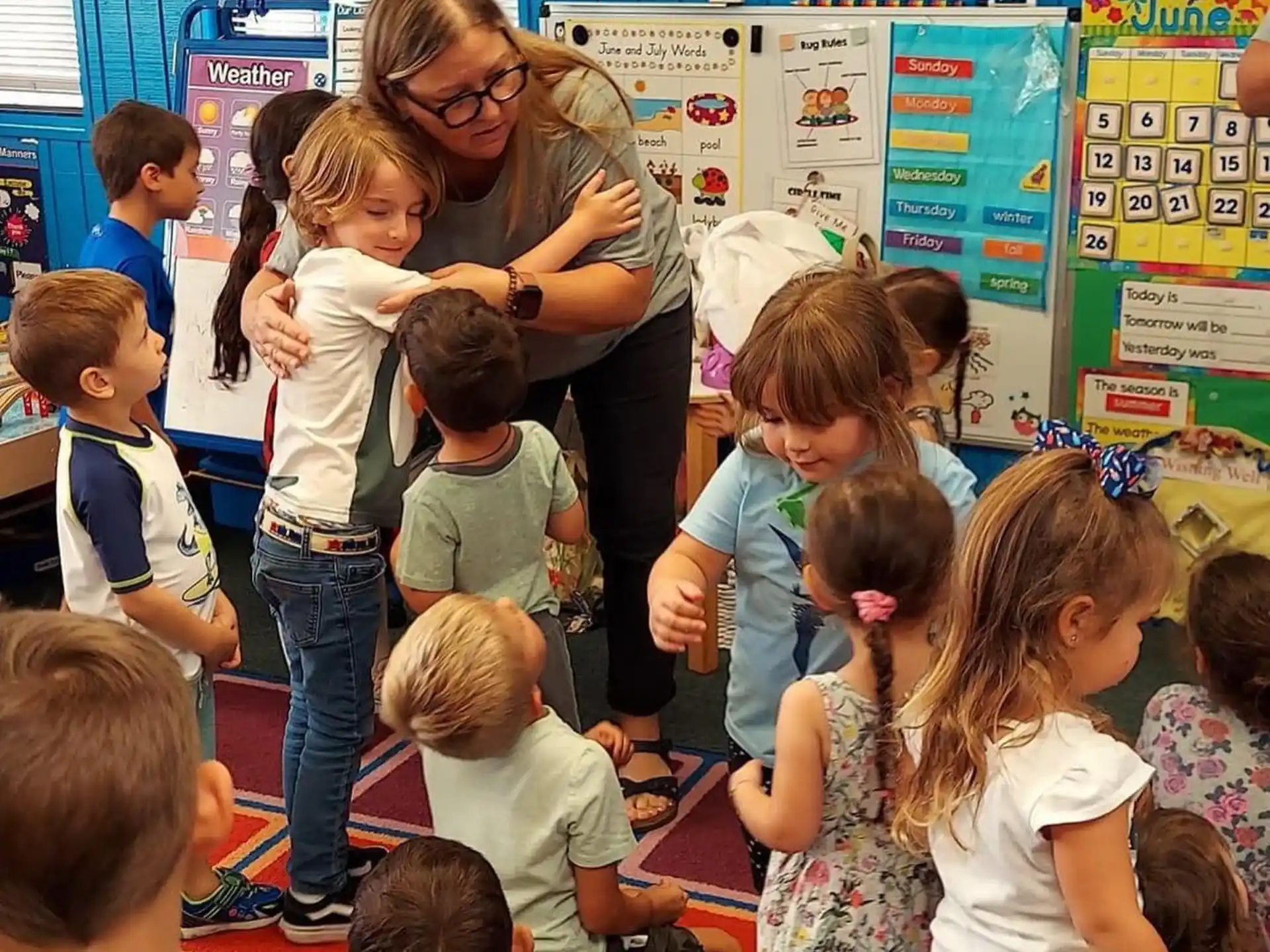 a person teaching a group of children