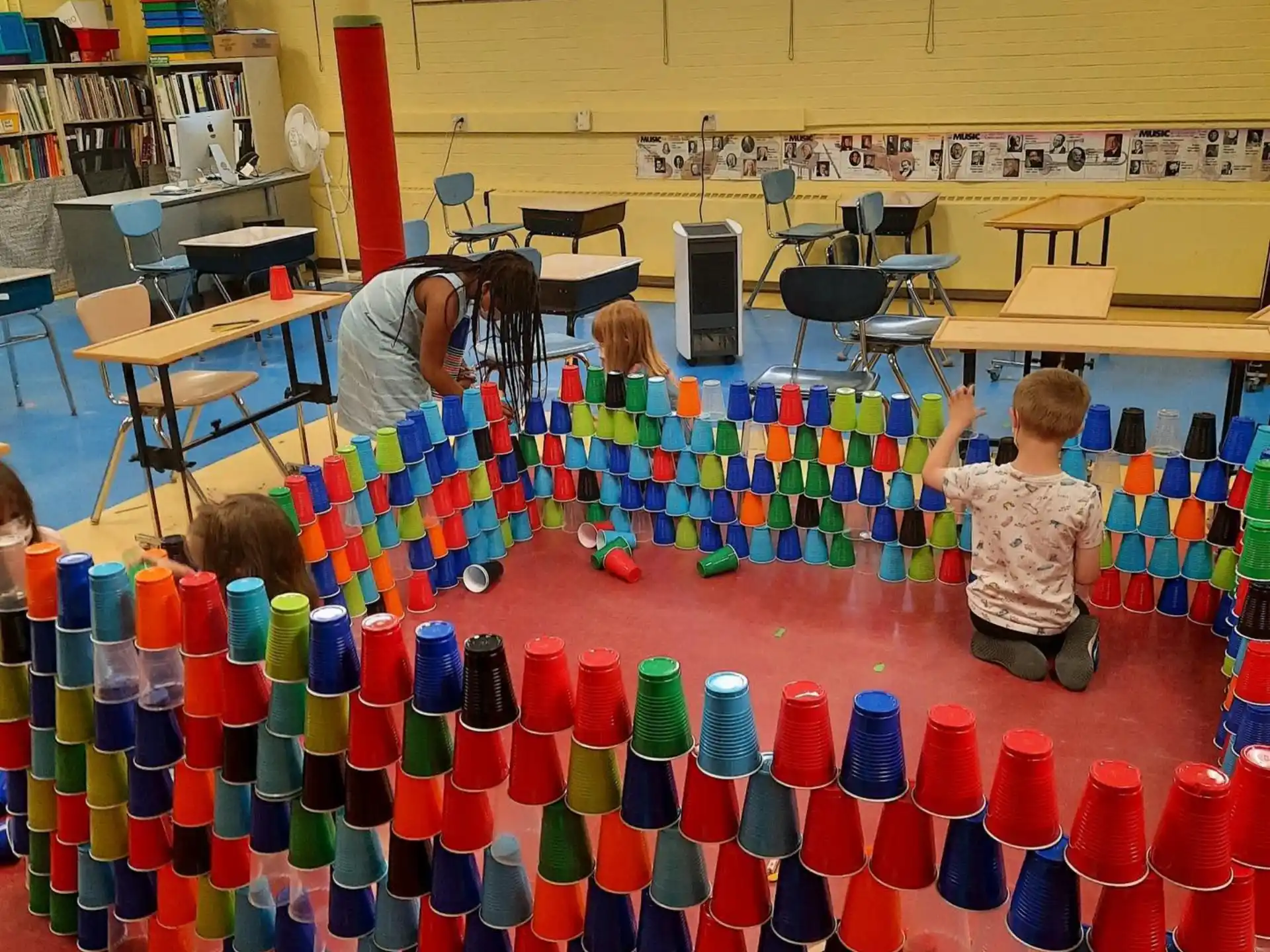 a group of kids playing with toys