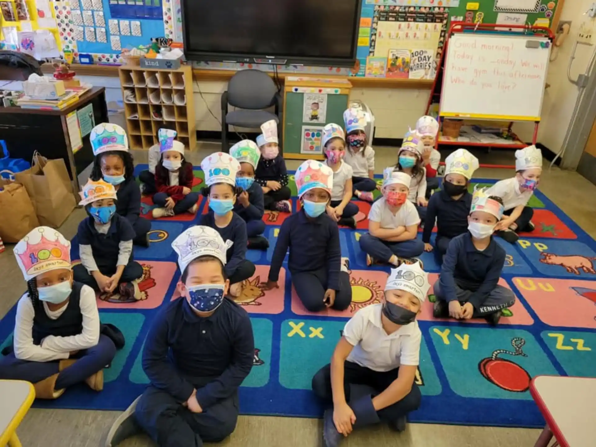 a group of children wearing masks