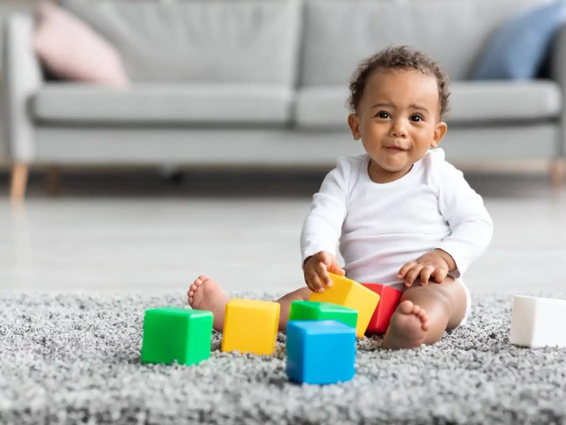a baby playing with toys