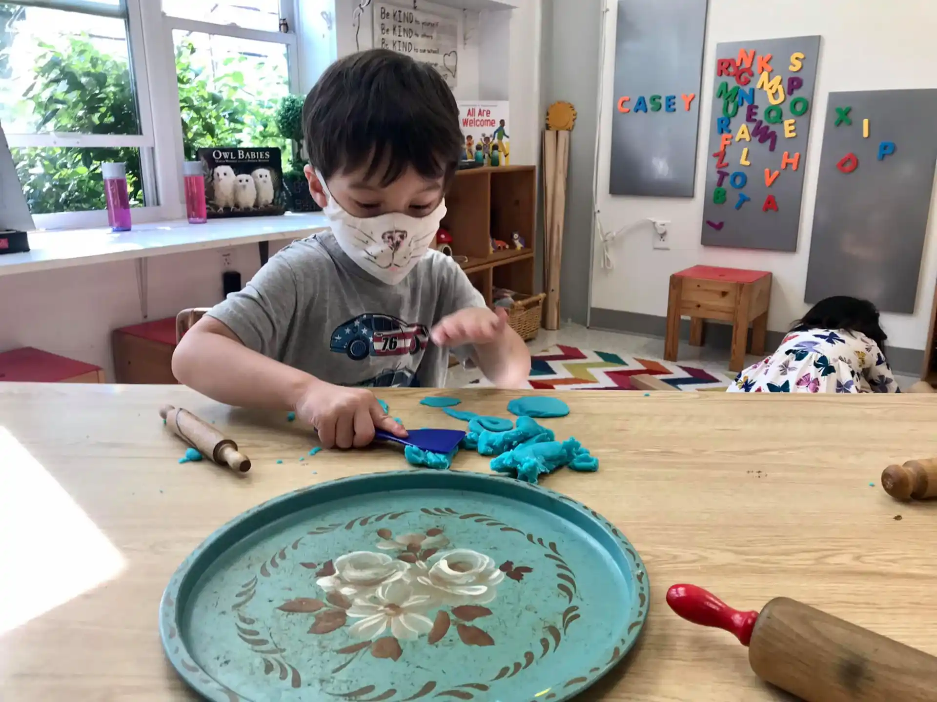 a child playing with toys