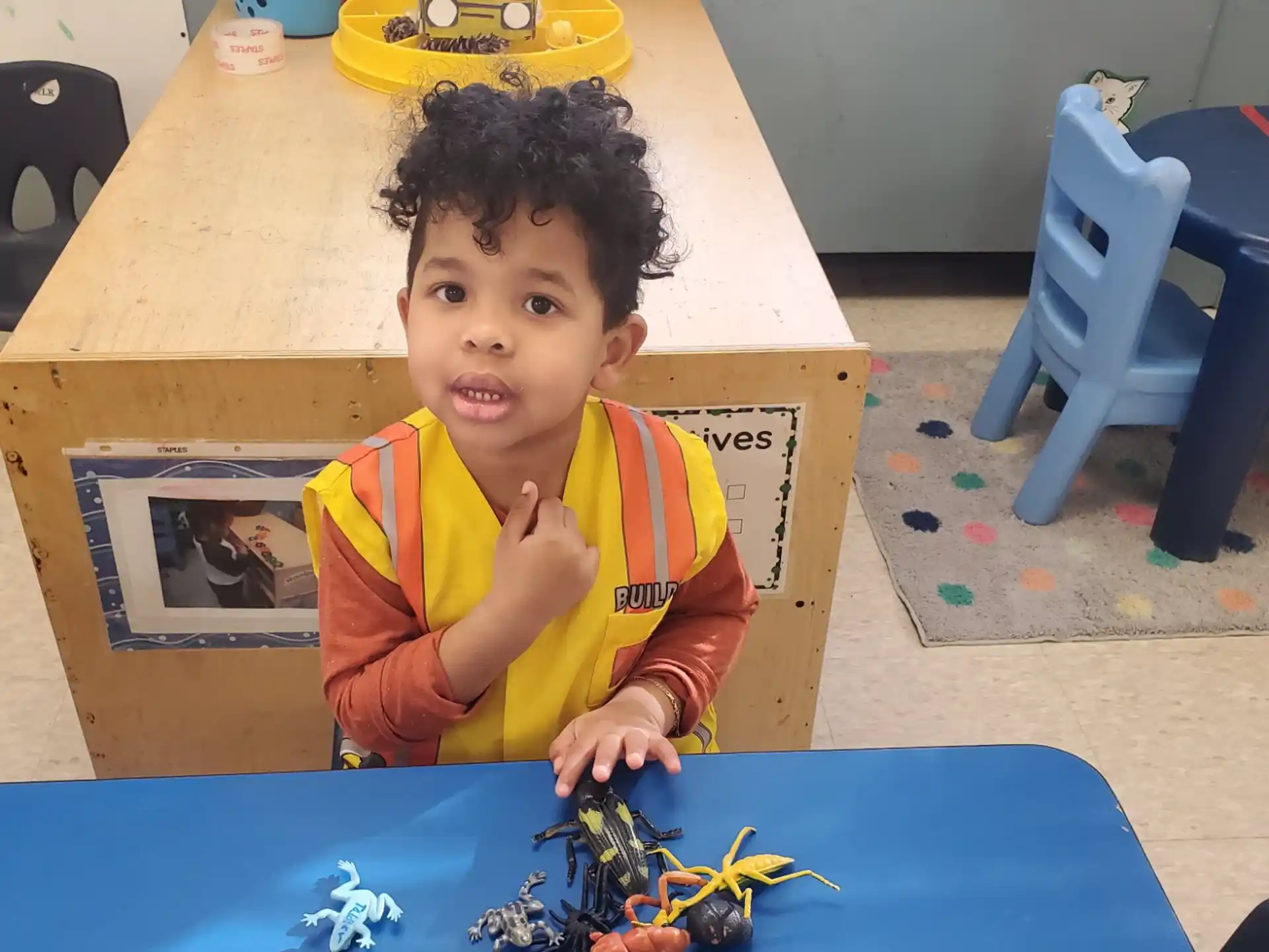 a child sitting at a table