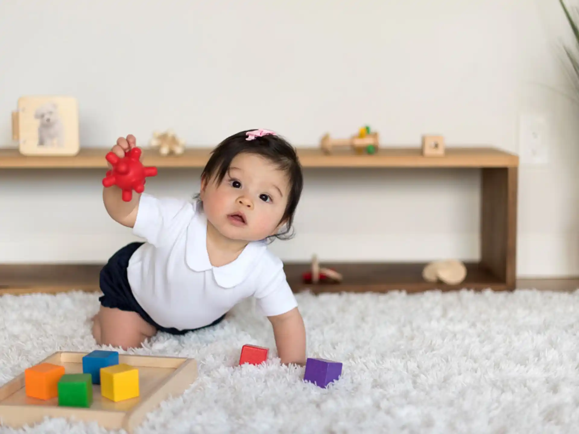 a baby playing with toys