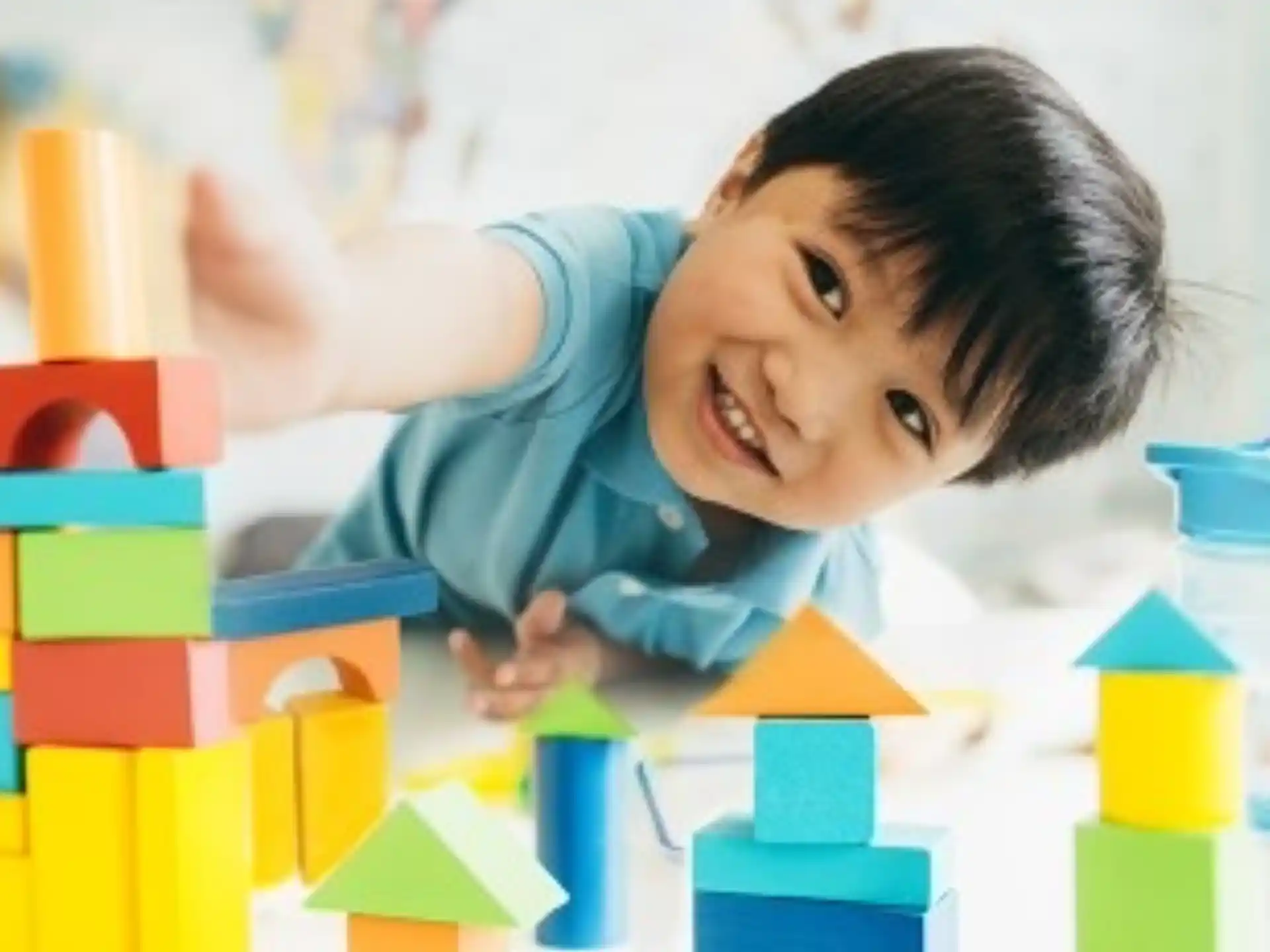 a child playing with blocks