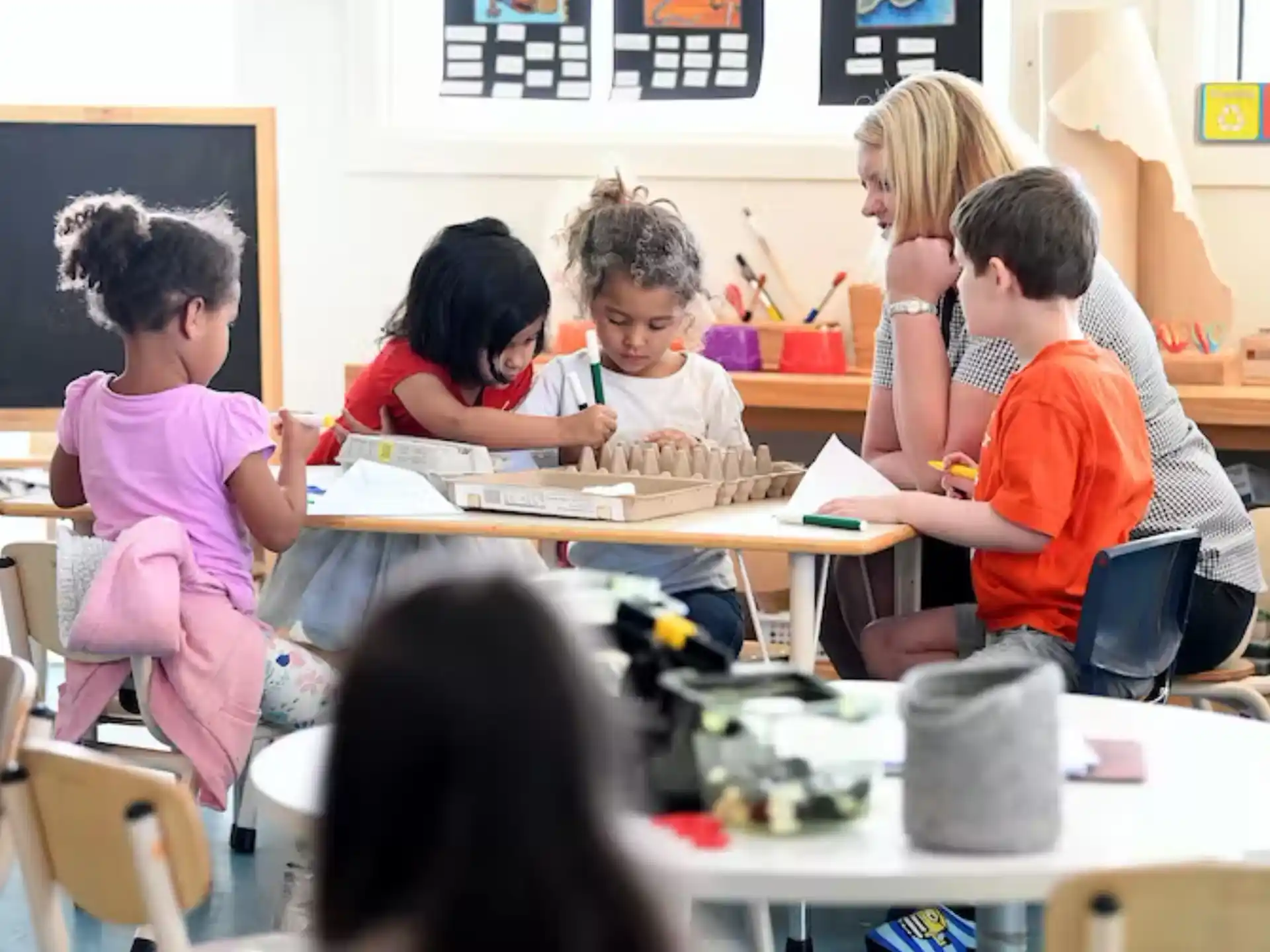 a group of children in a classroom