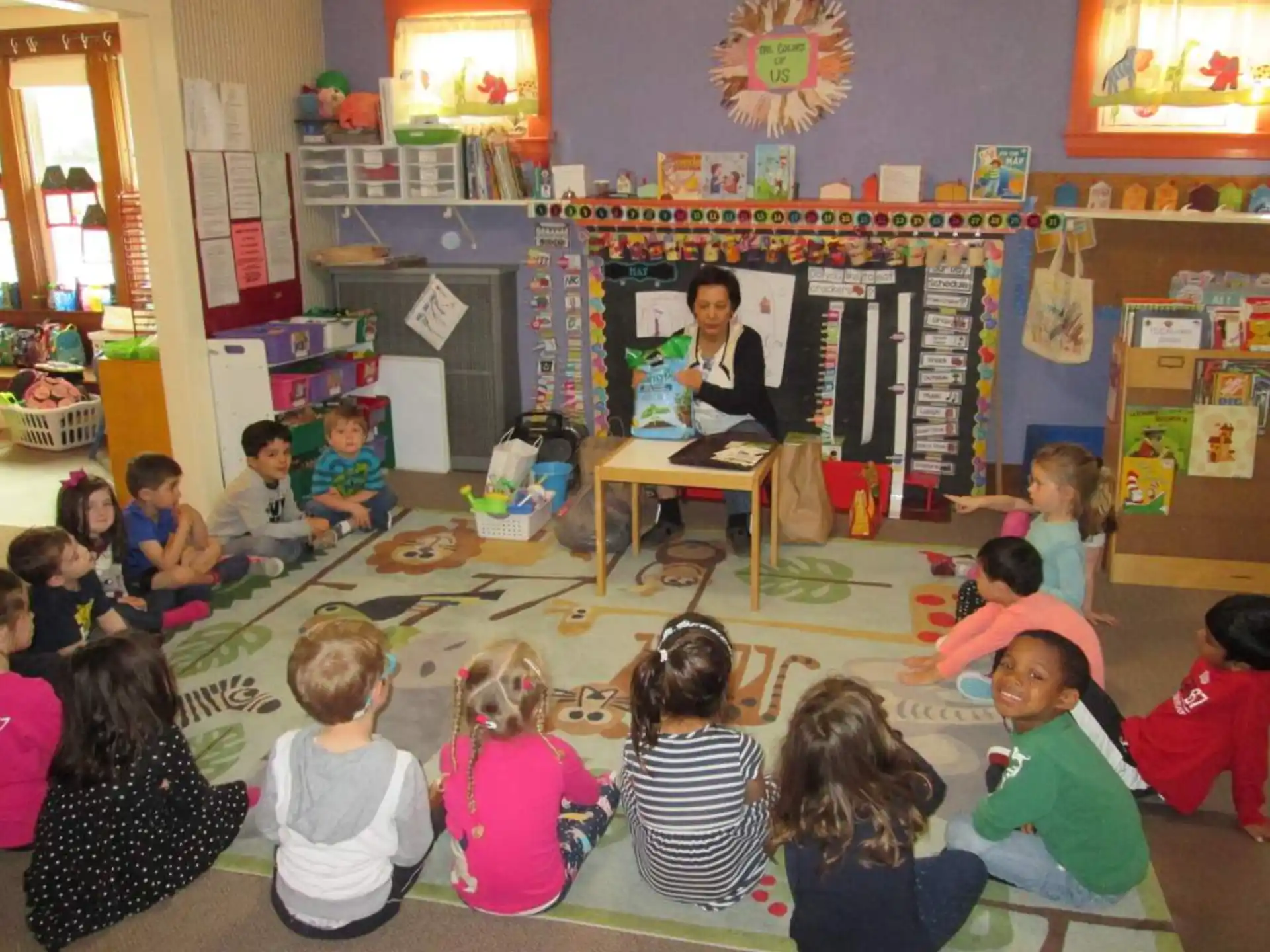 a person teaching children in a classroom
