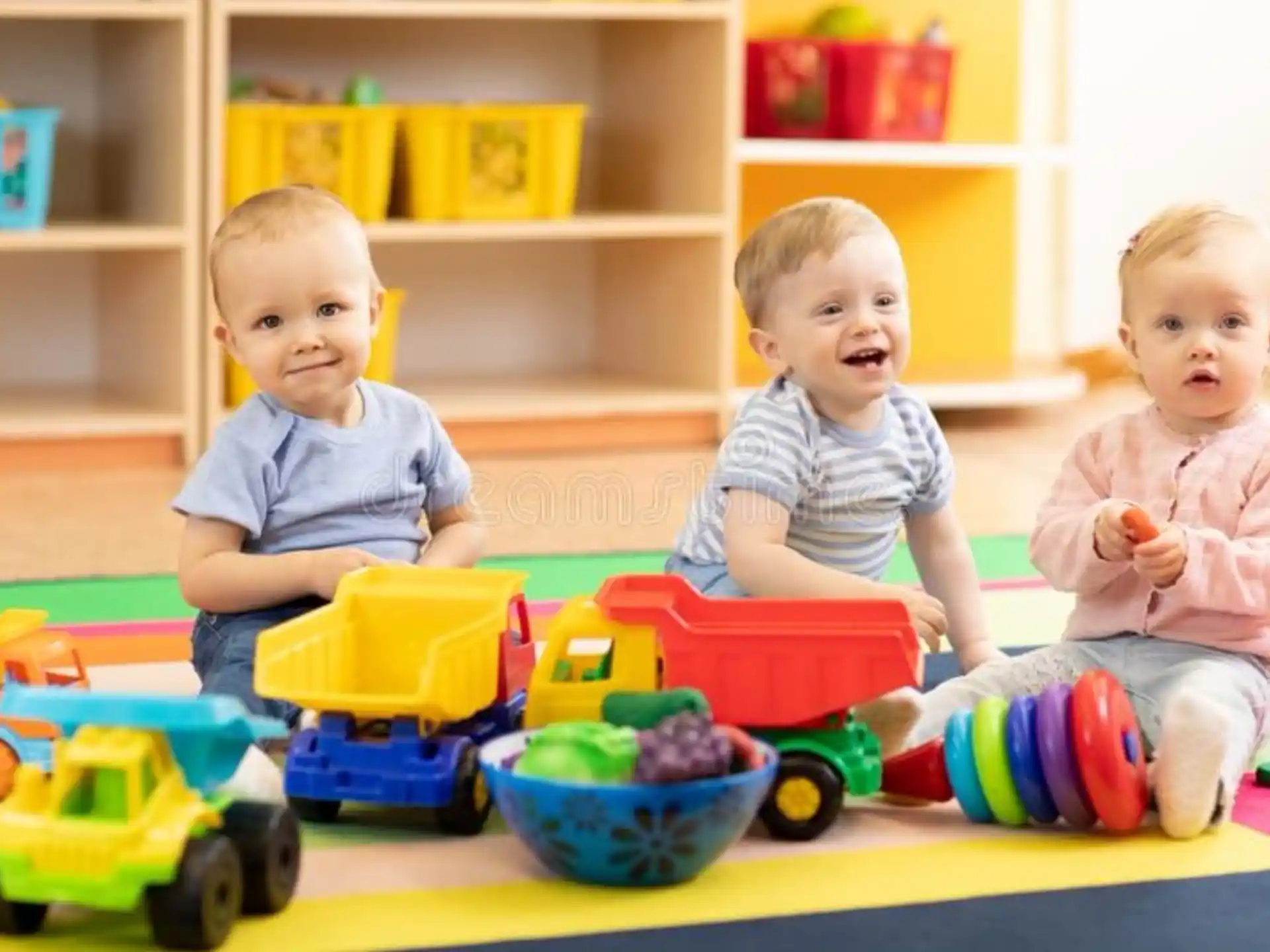 a group of kids playing with toys