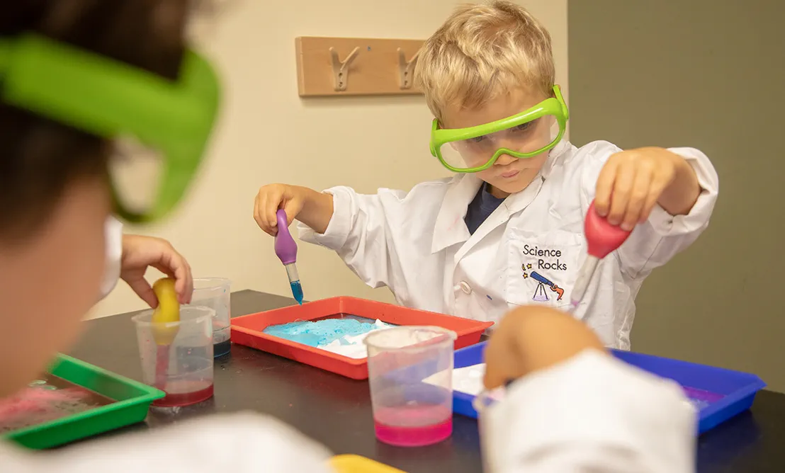 a few children wearing safety goggles