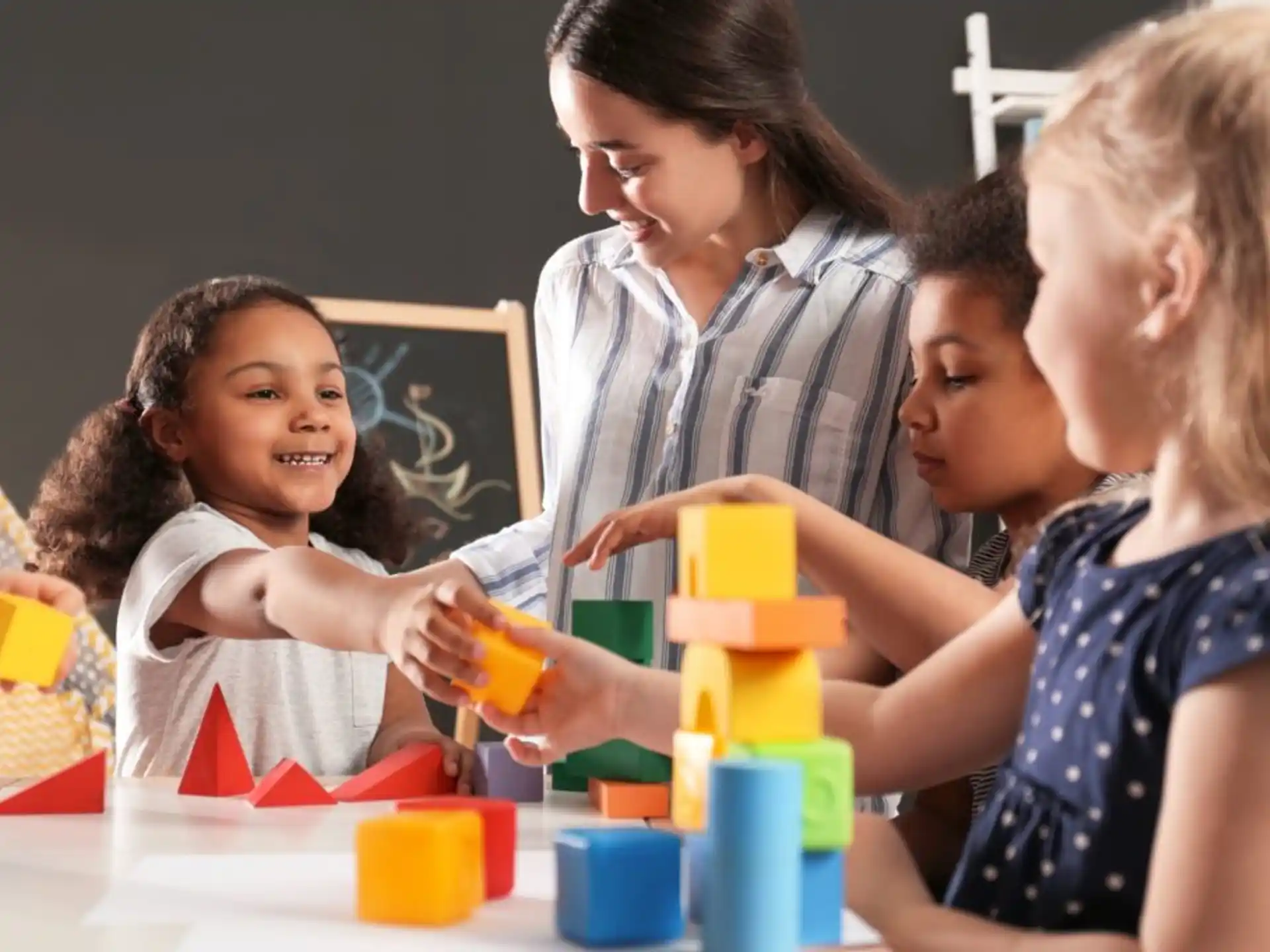 a person and a few children playing with toys