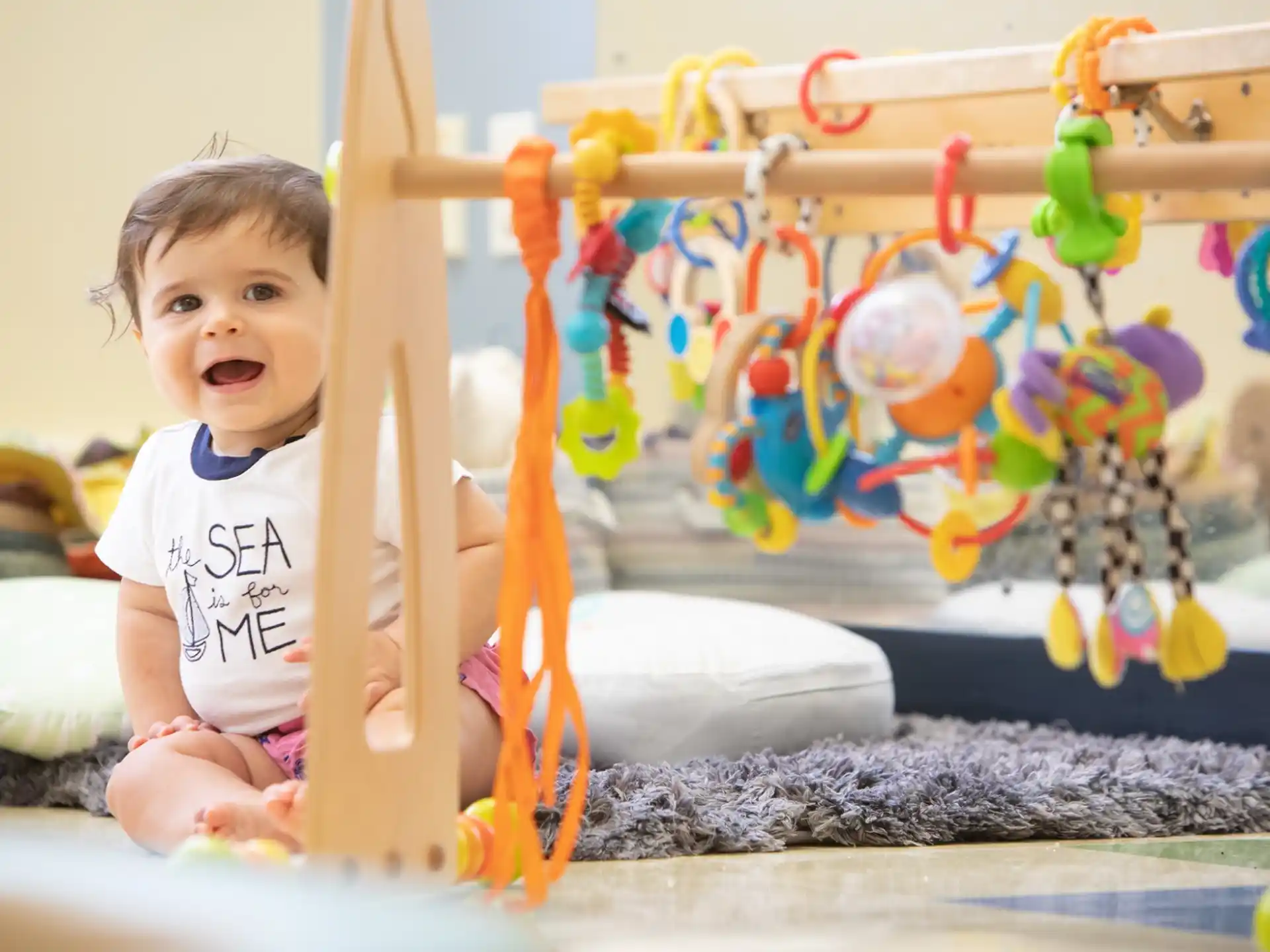 a baby playing with toys