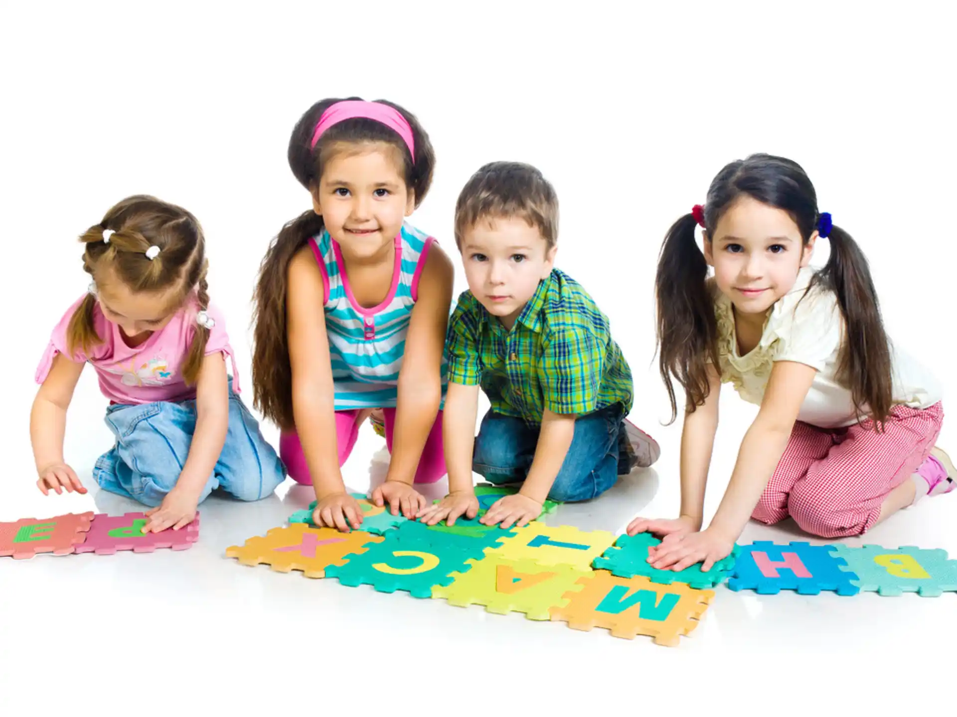a group of children sitting on the floor