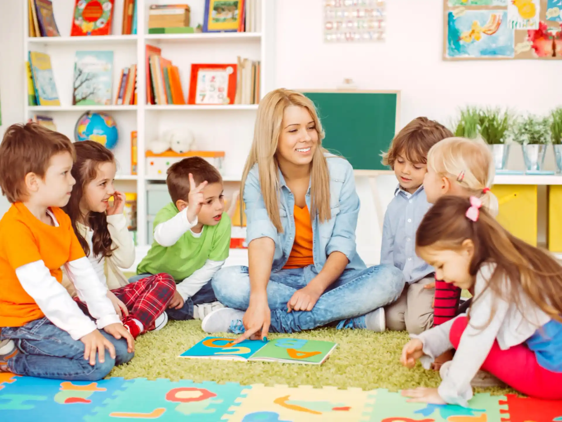 a group of children sitting on the floor
