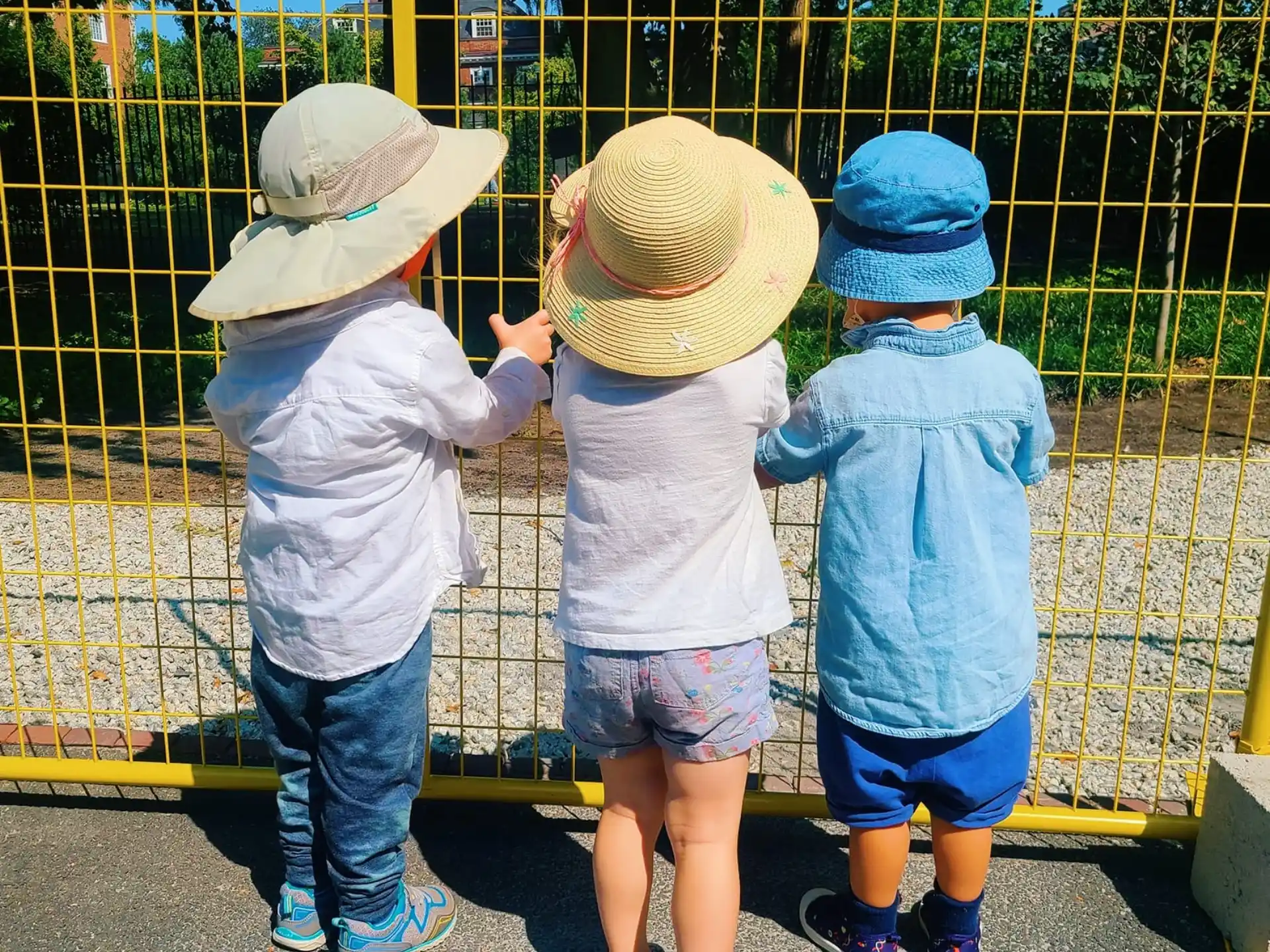 a group of children wearing hats