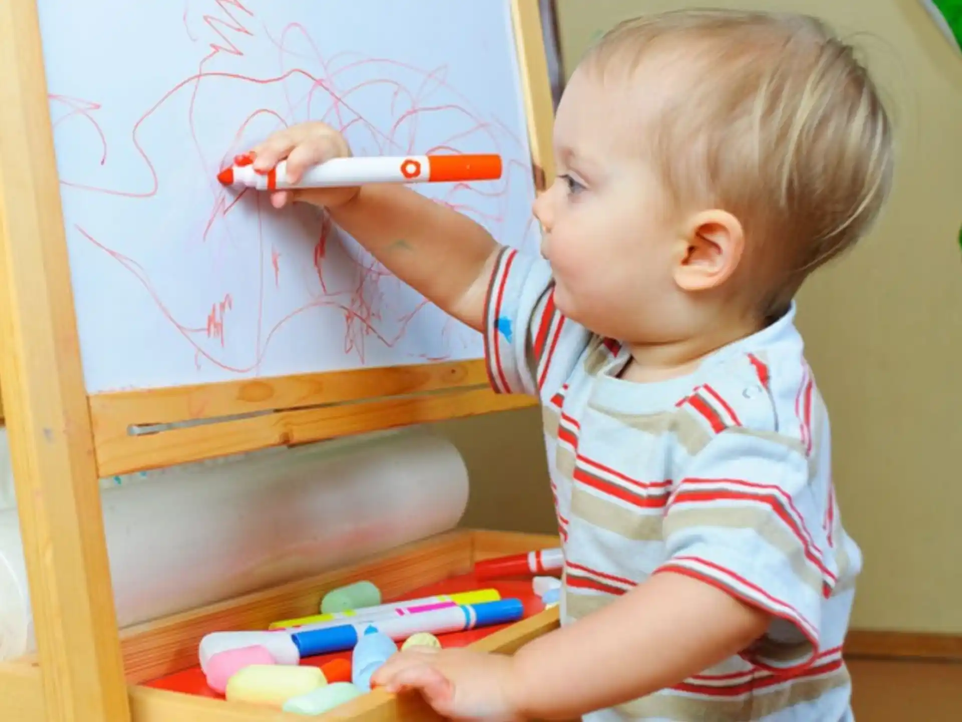 a baby playing with a toy