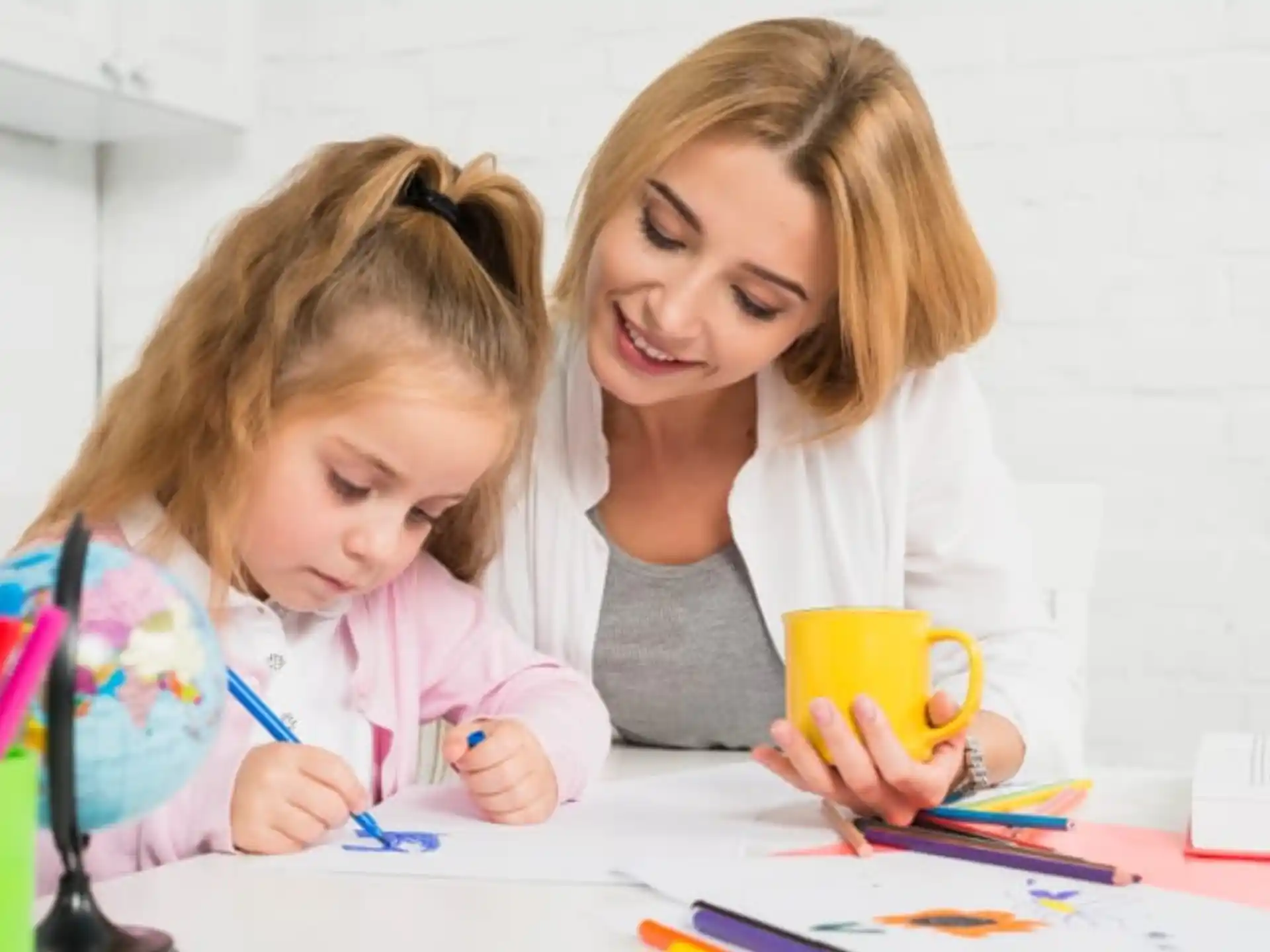 a person and a girl painting